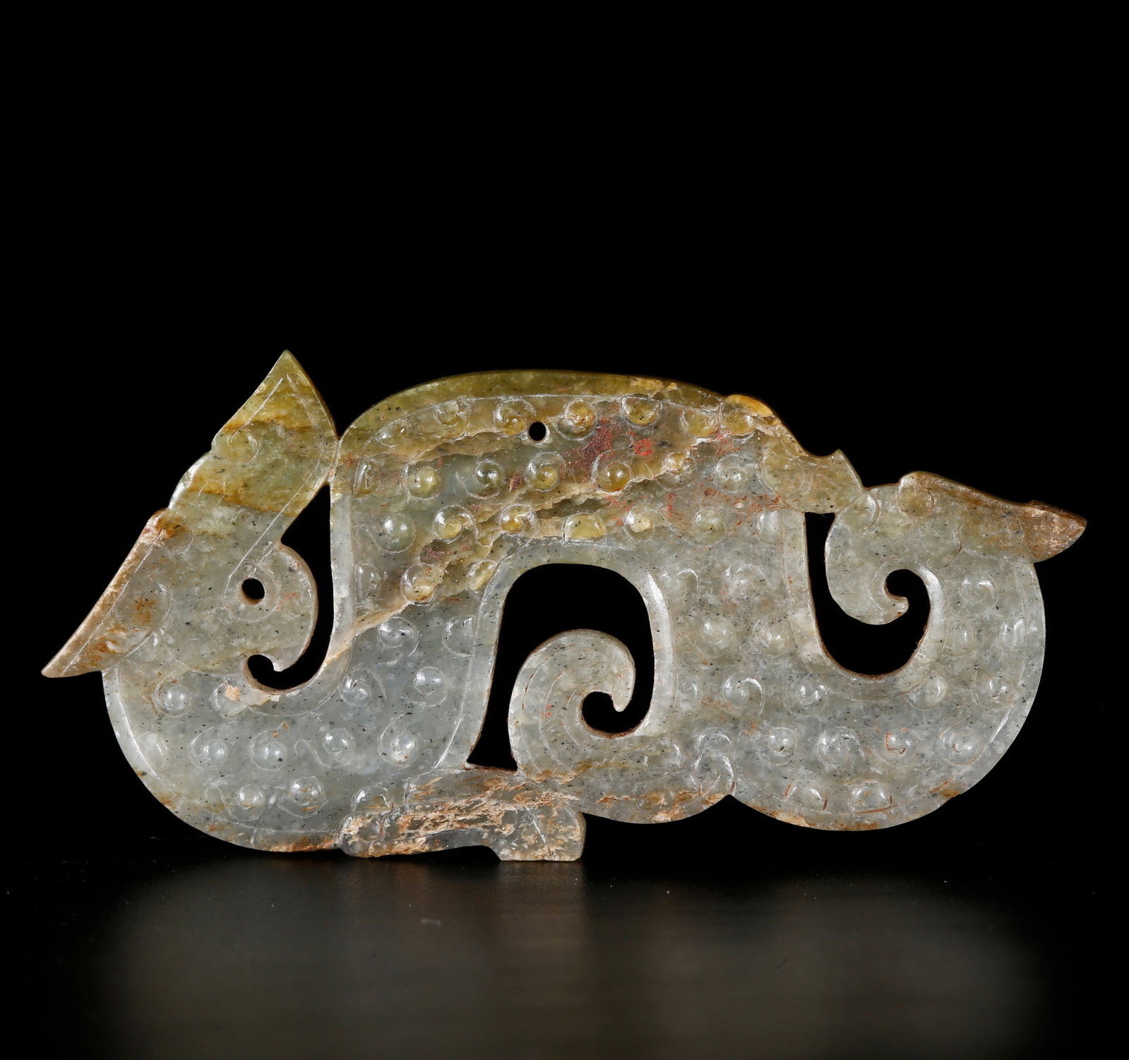 A ANCIENT JADE CARVED DRAGON PENDANT (1 of 10)