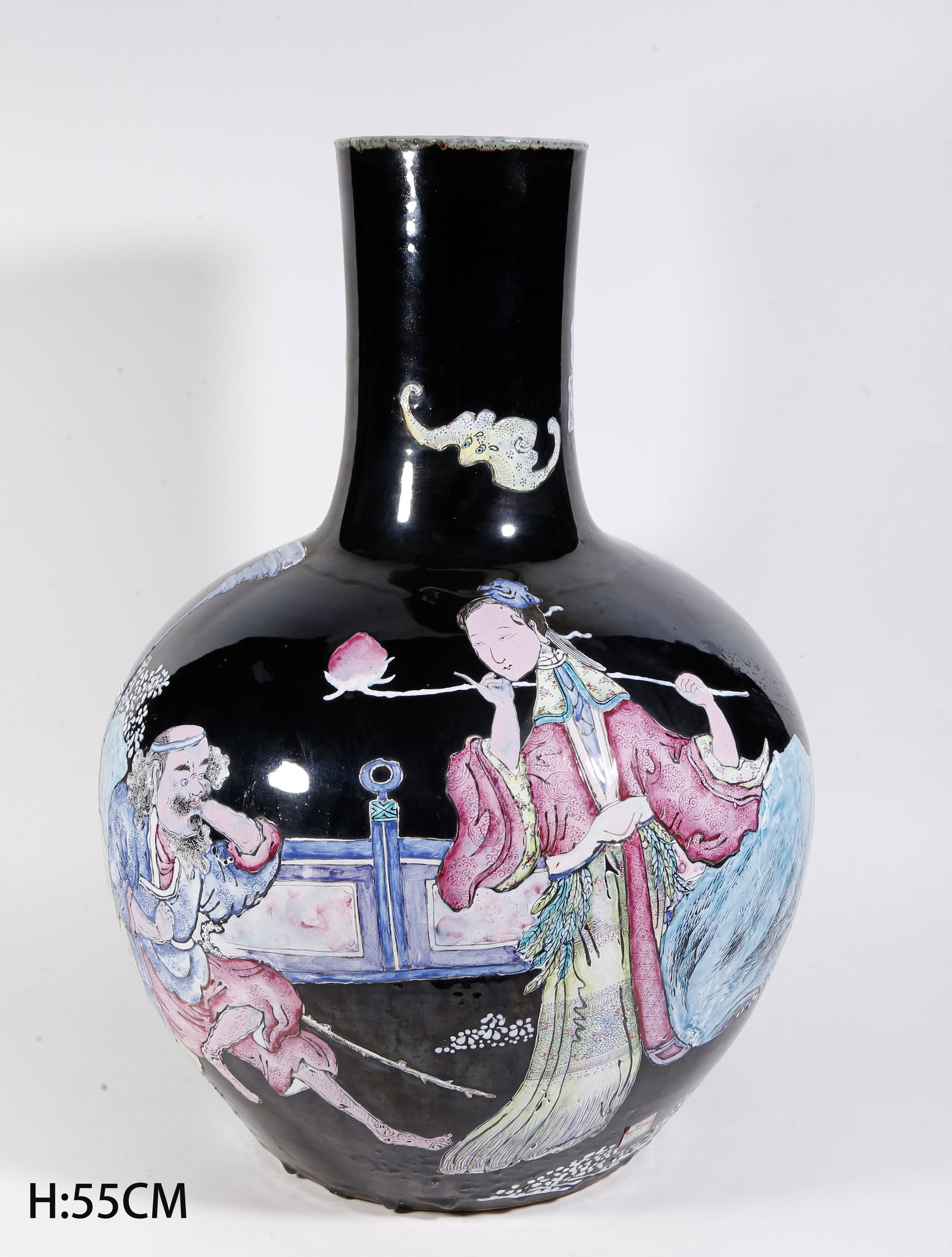 A BLACK-GROUND FAMILLE ROSE MAGU PRESENTING LONGEVITY LARGE CELESTIAL SPHERE VASE: Black-ground Famille Rose Magu Presenting Longevity Large Celestial Sphere Vase