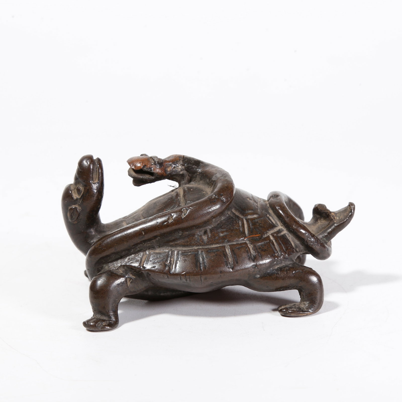 A BRONZE TORTOISE-SNAKE SHAPED PAPERWEIGHT: Bronze Tortoise-Snake Shaped Paperweight