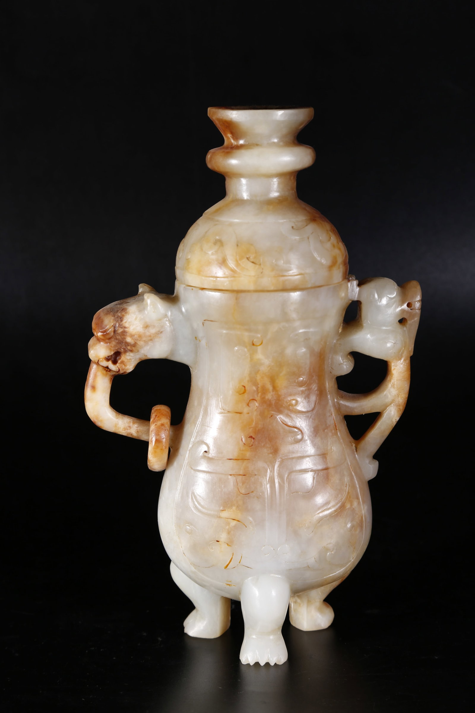 A NEPHRITE TRIPOD COVERED VASE WITH BEAST MASK PATTERNS: Nephrite Tripod Covered Vase with Beast Mask Patterns
