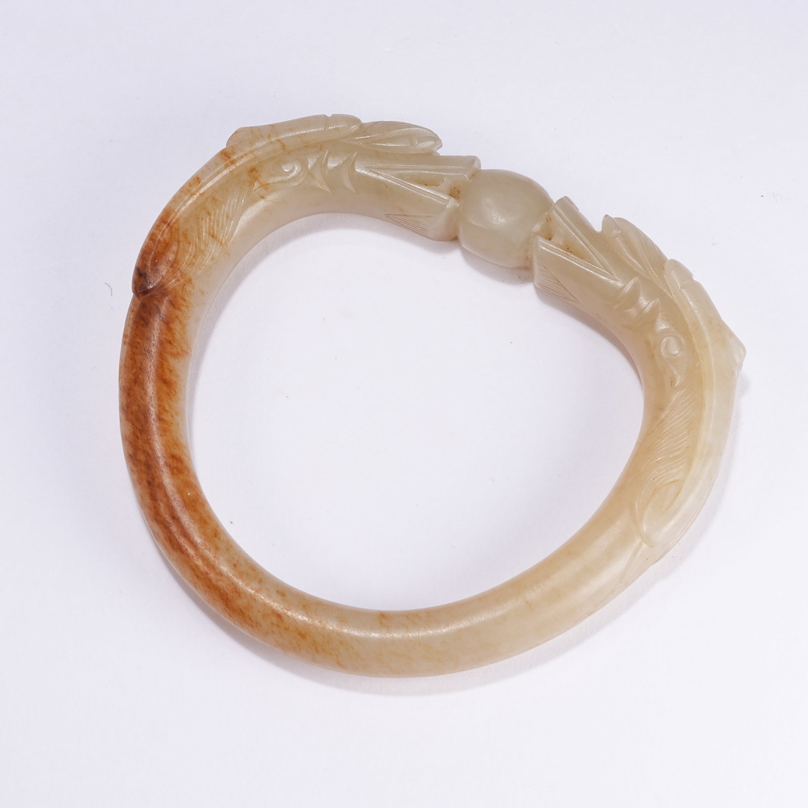A HETIAN JADE BANGLE WITH DOUBLE DRAGONS CHASING PEARL PATTERN (1 of 10)