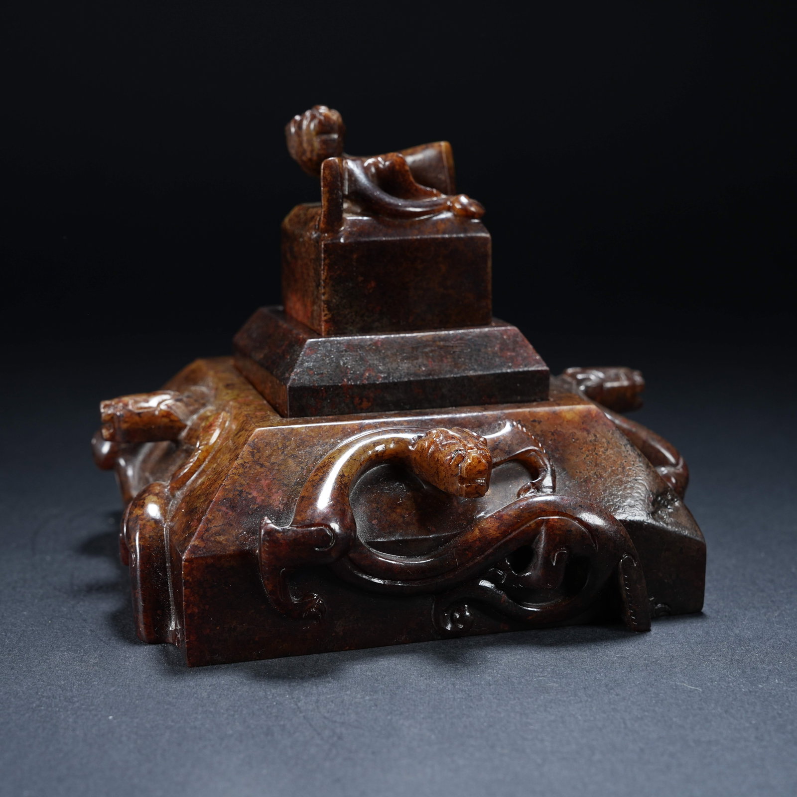 A ARCHAIC JADE SET OF THREE SEALS WITH FIVE DRAGONS (1 of 9)