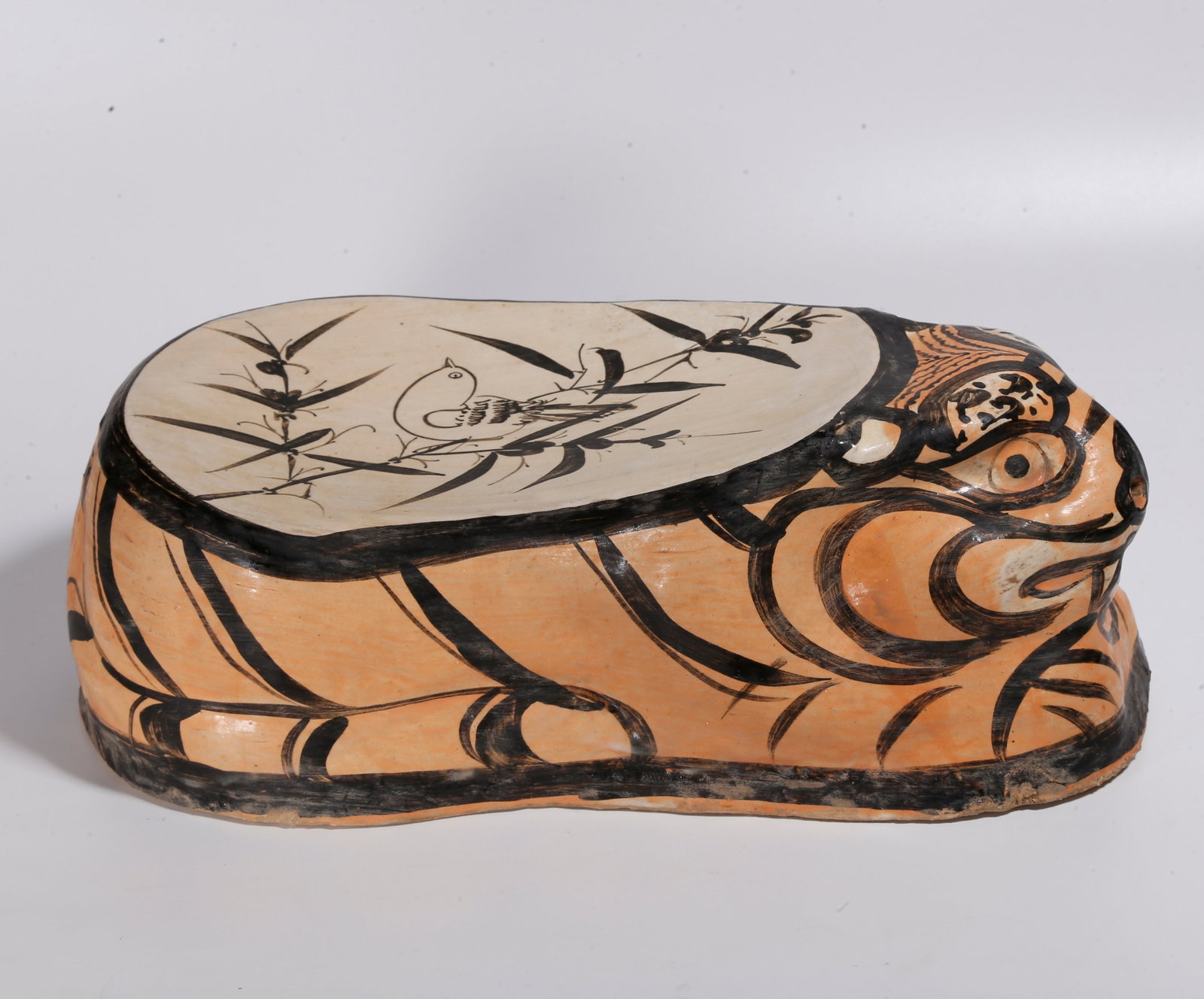 A CIZHOU KILN TIGER-SHAPED PILLOW: Cizhou Kiln Tiger-shaped Pillow