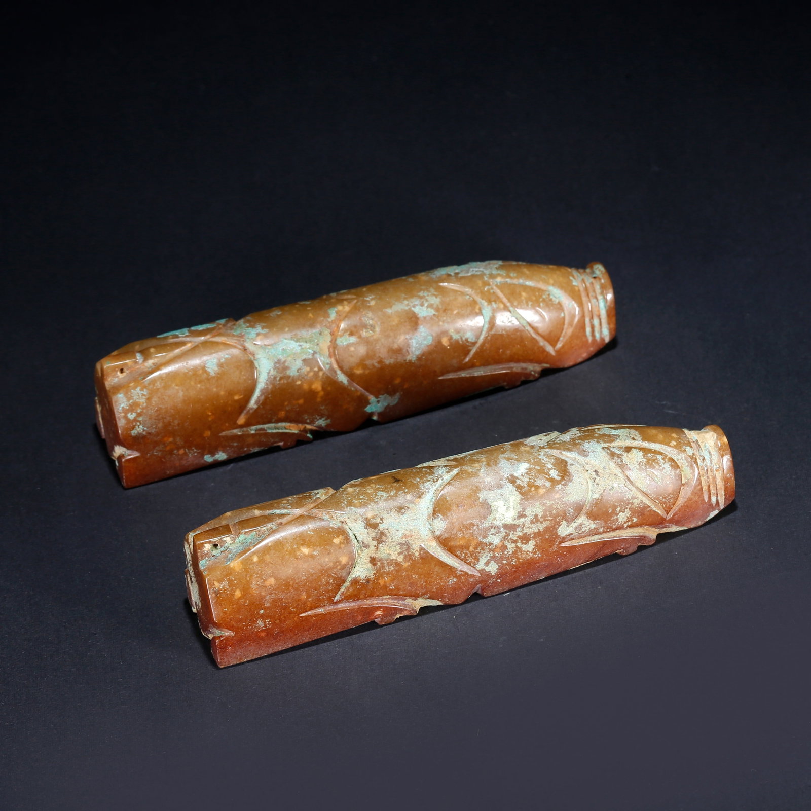 A PAIR OF ARCHAIC JADE HAND PIECES: Pair of Archaic Jade Hand Pieces