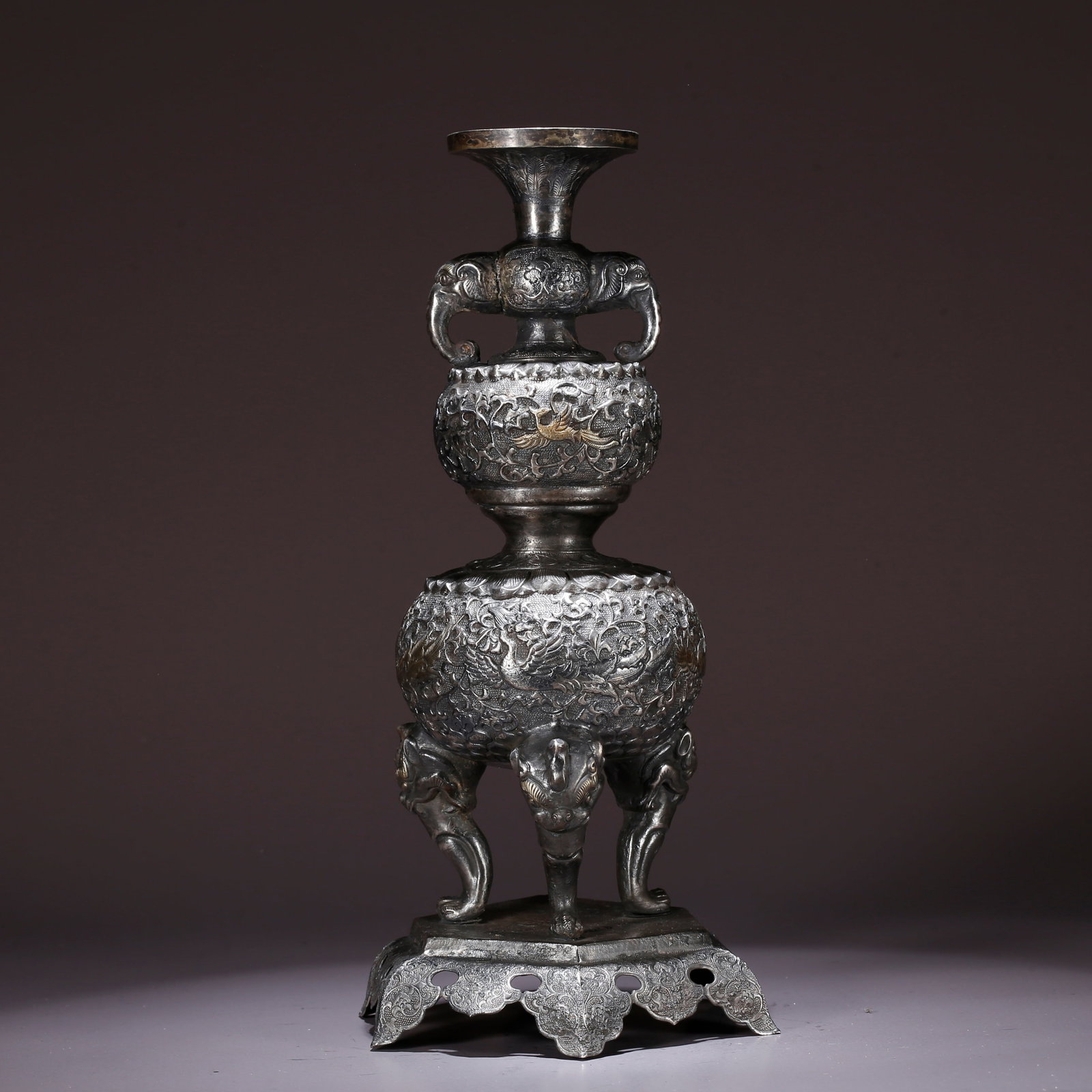 A SILVER GOURD-SHAPED DOUBLE-HANDLED VASE WITH AUSPICIOUS BEAST PATTERN: Silver Gourd-Shaped Double-Handled Vase with Auspicious Beast Pattern