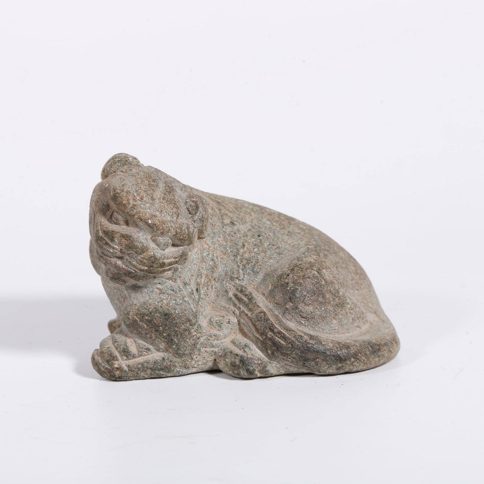 A STONE LION ORNAMENT: Stone Lion Ornament