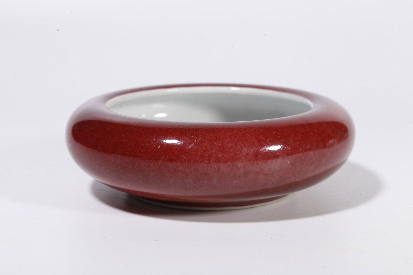 A RED GLAZE WASHER - 2