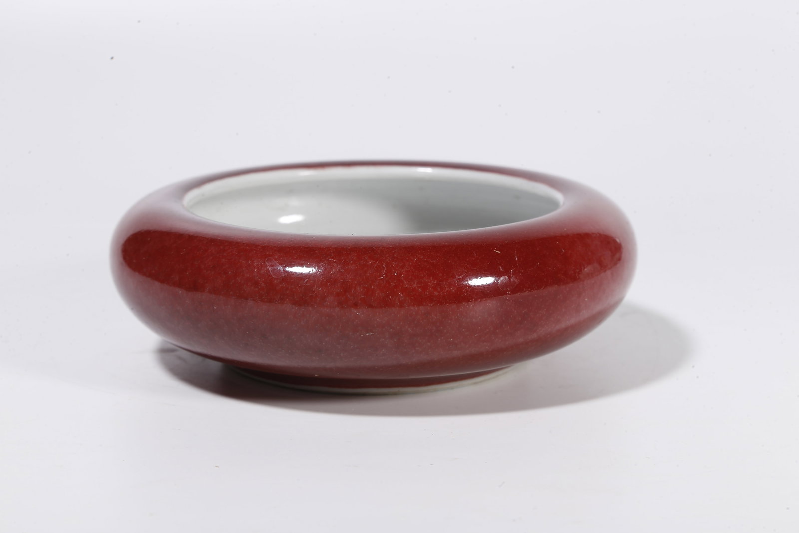A RED GLAZE WASHER - 3