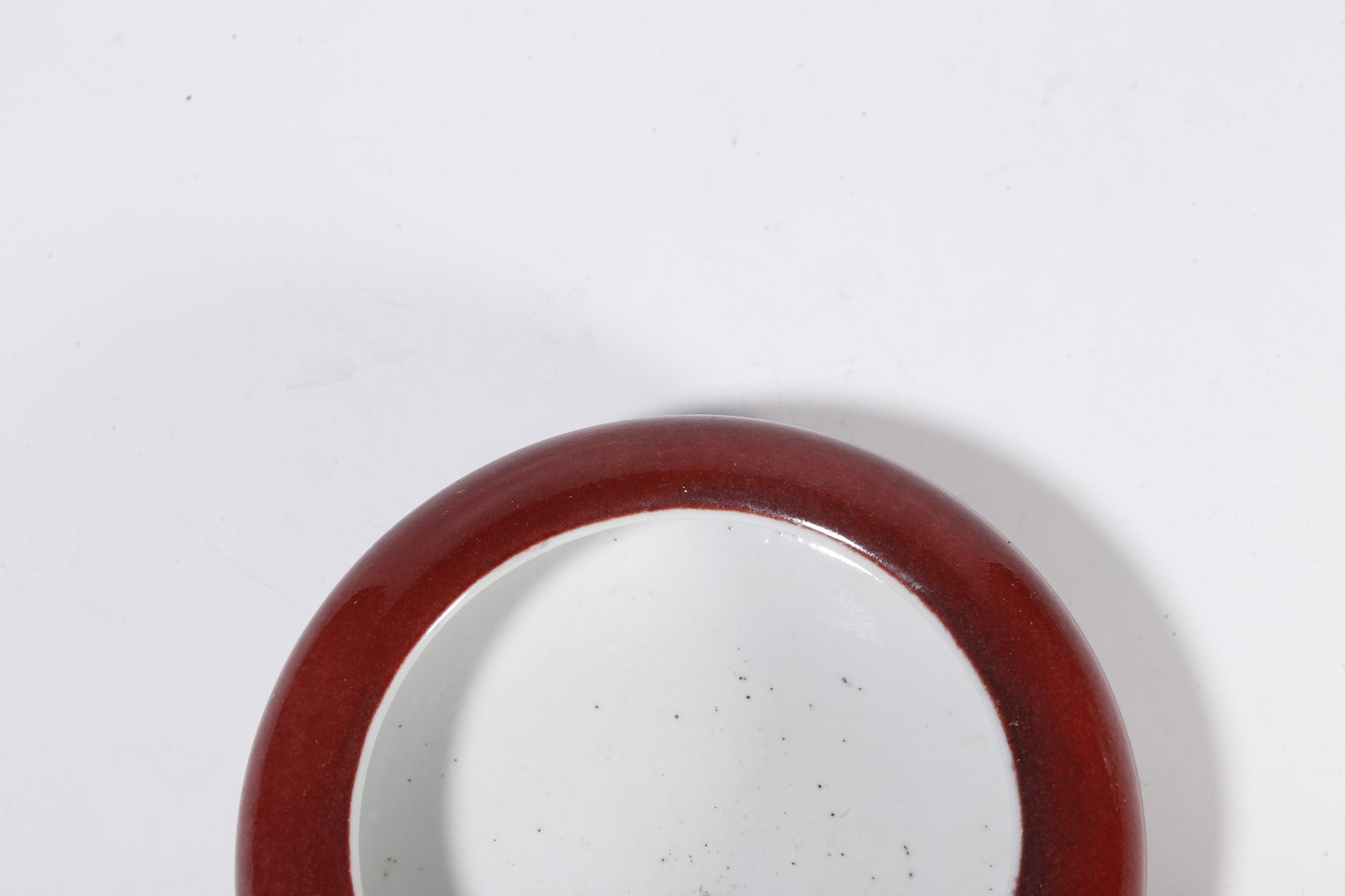 A RED GLAZE WASHER - 8
