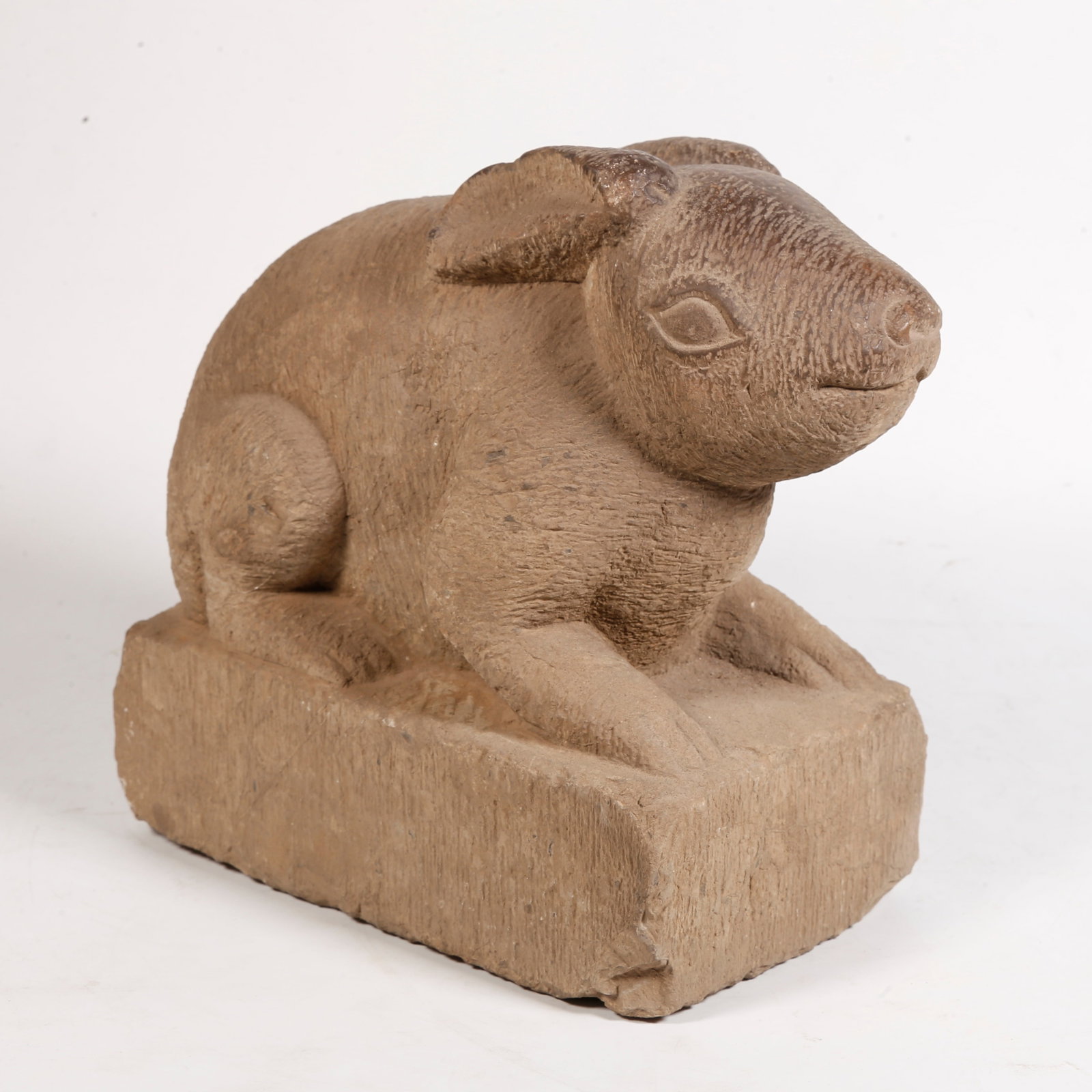 A STONE RABBIT ORNAMENT: Stone Rabbit Ornament