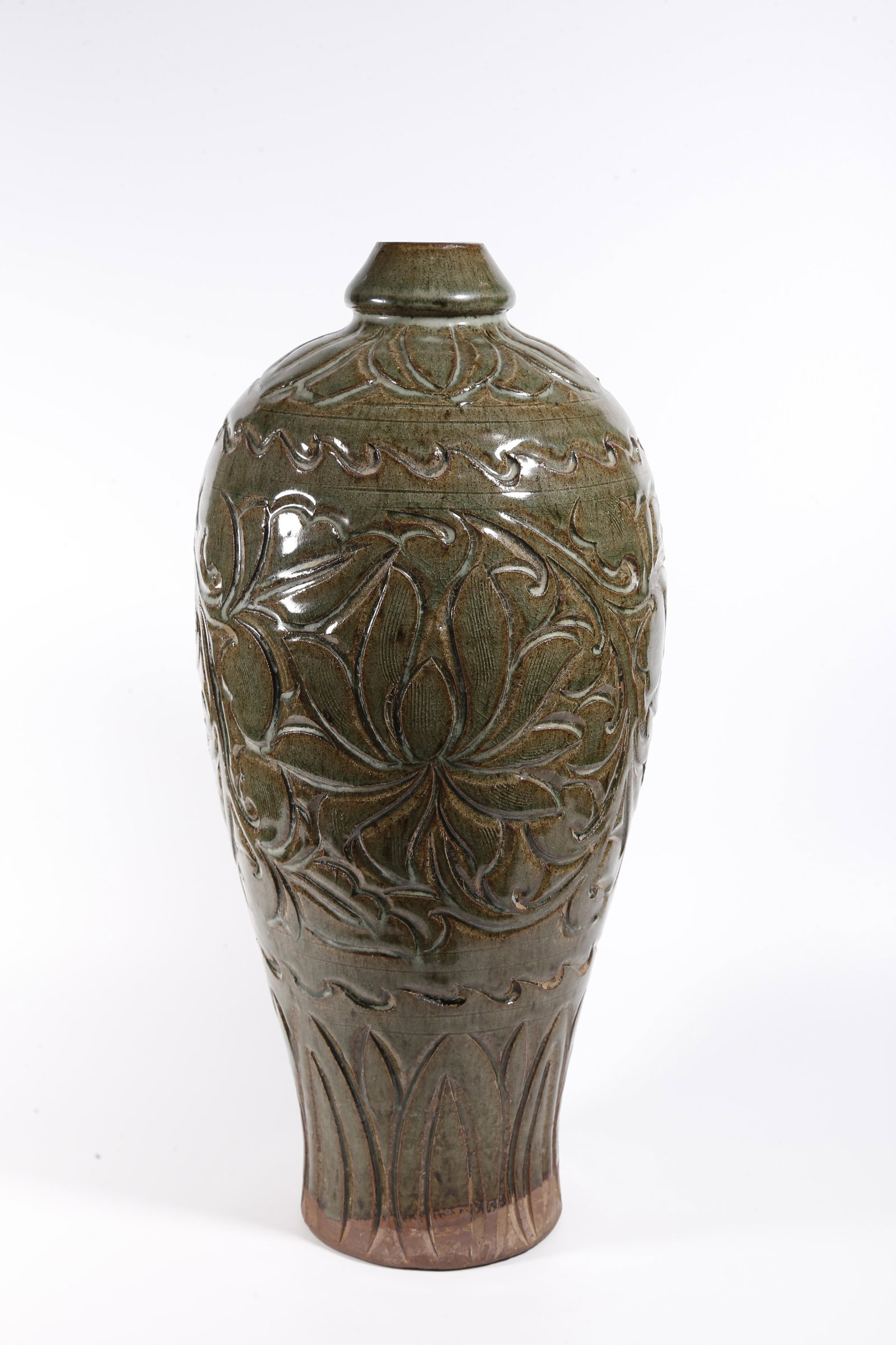 A CARVED CELADON PLUM VASE: Carved Celadon Plum Vase
