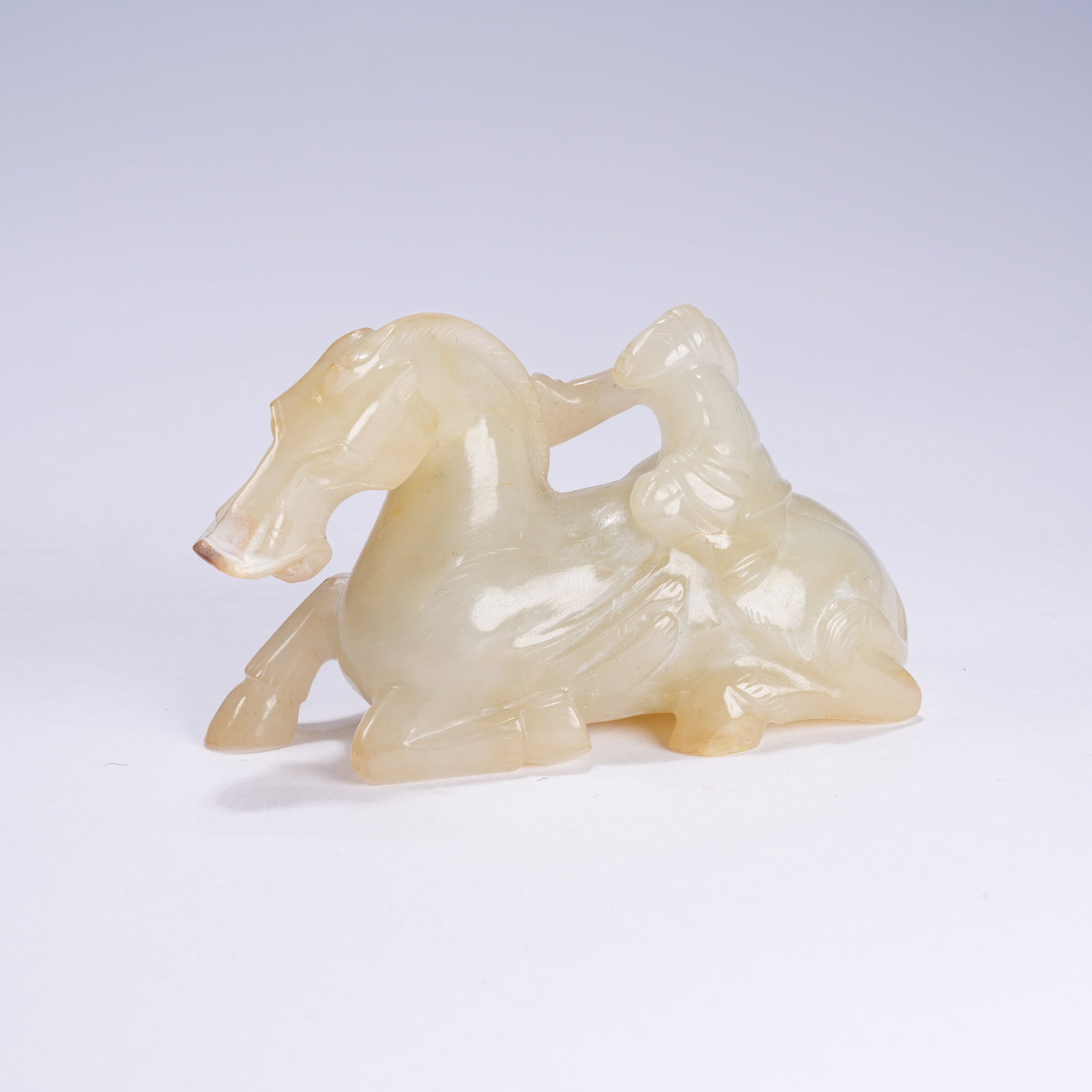 A ANCIENT JADE ORNAMENT OF MAN RIDING HORSE (1 of 8)