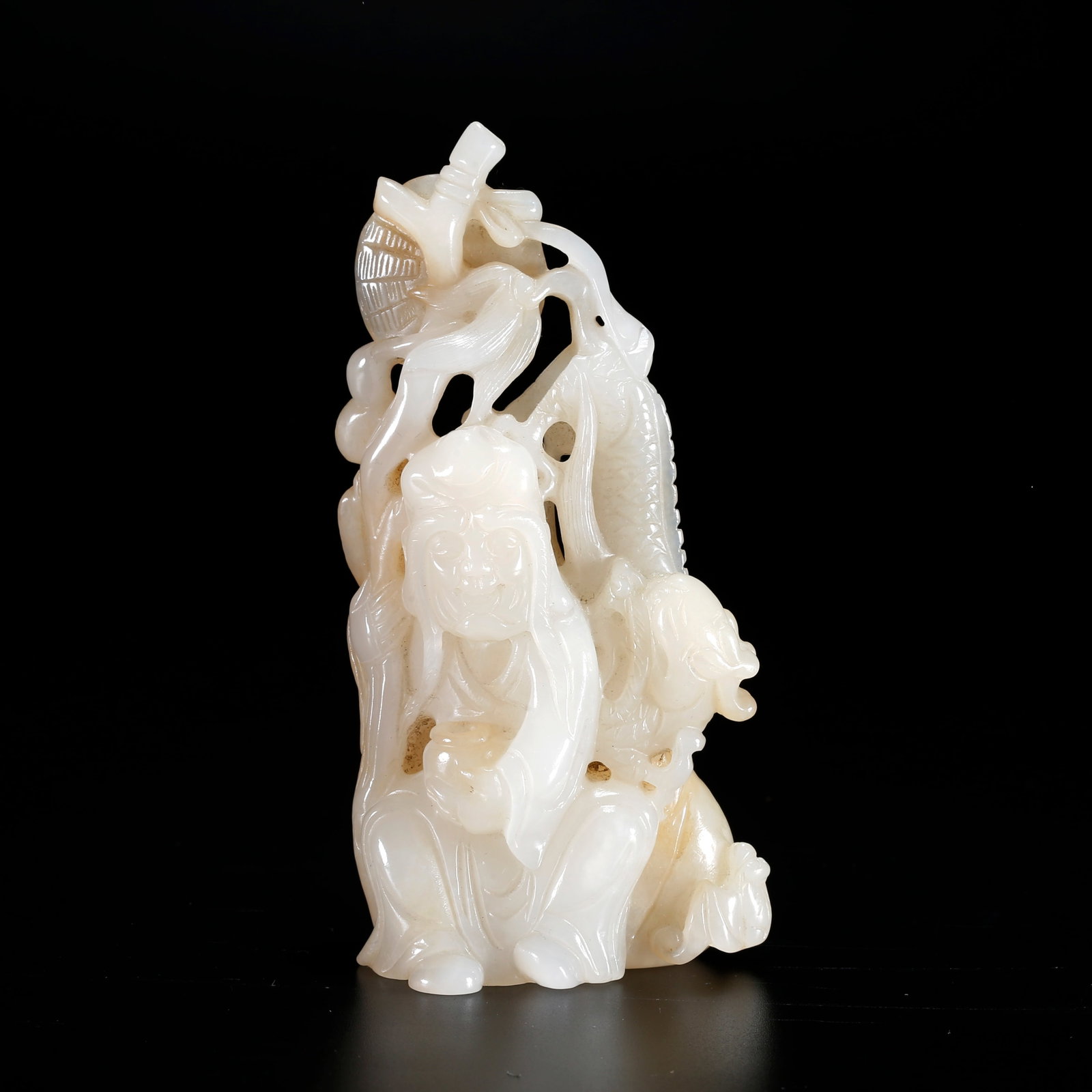 A ARHAT STATUE CARVED FROM HETIAN JADE (1 of 9)