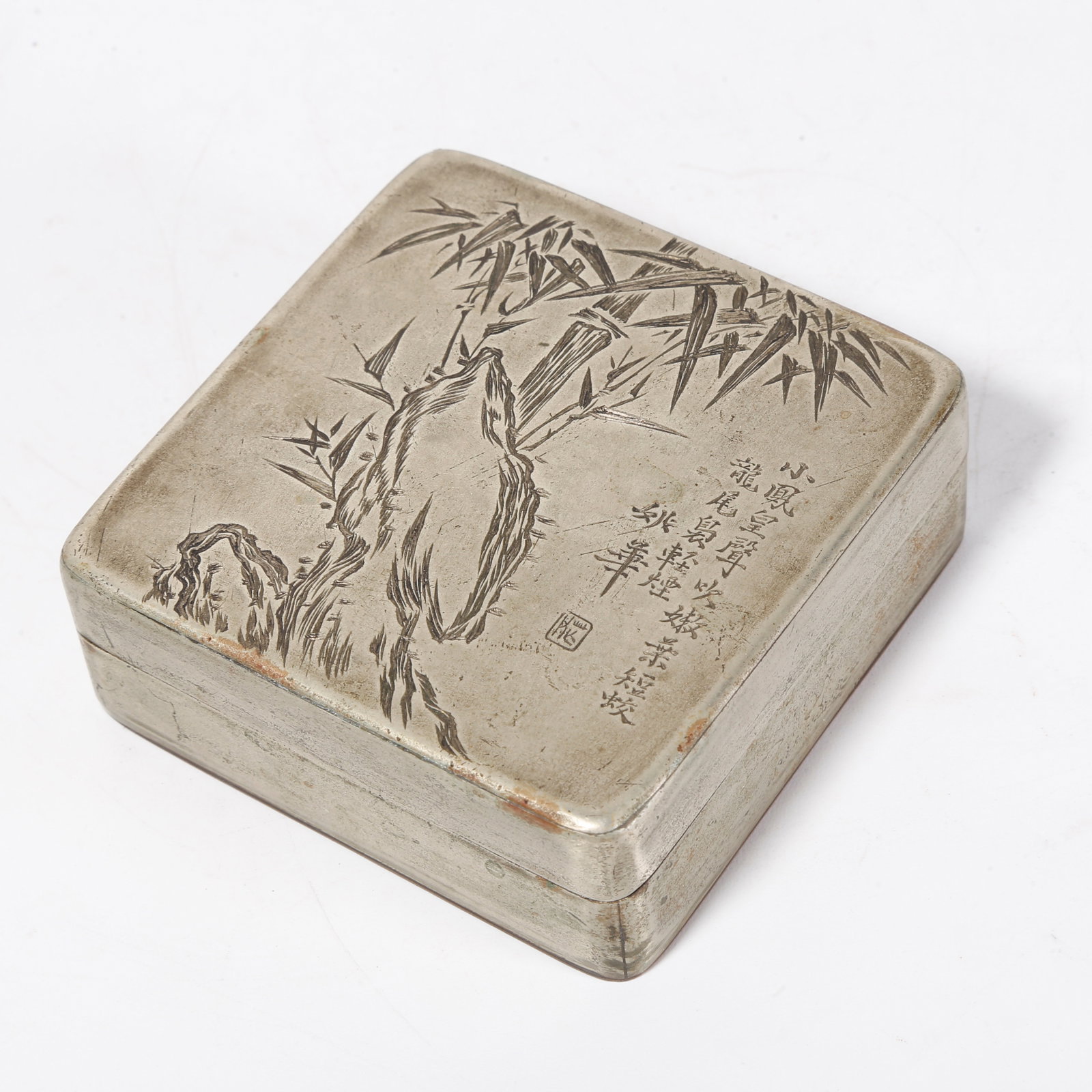 A WHITE BRONZE INK BOX CARVED WITH BAMBOO AND ROCK PATTERN (1 of 9)