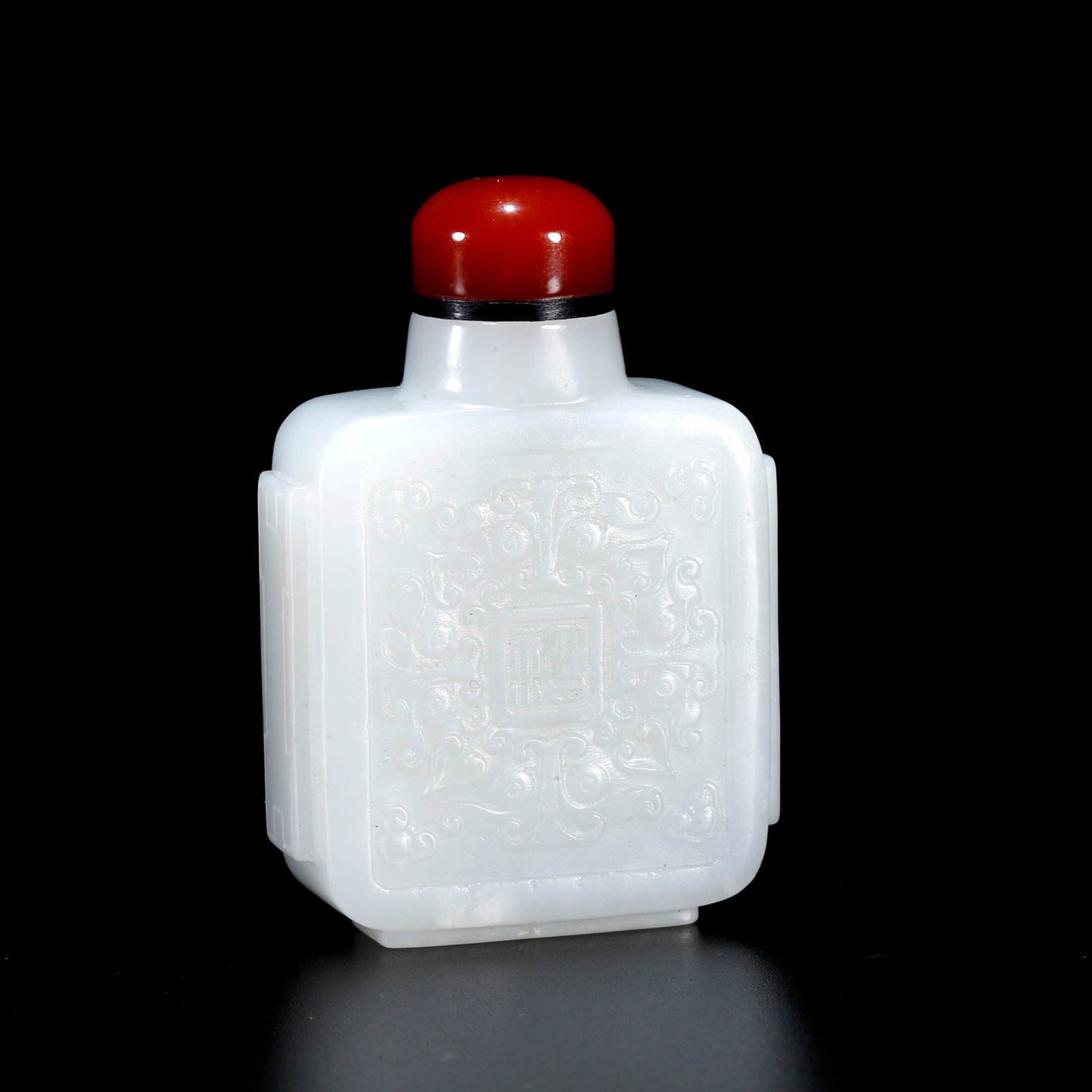 A HETIAN JADE SNUFF BOTTLE CARVED WITH BEAST MASK PATTERN (1 of 11)