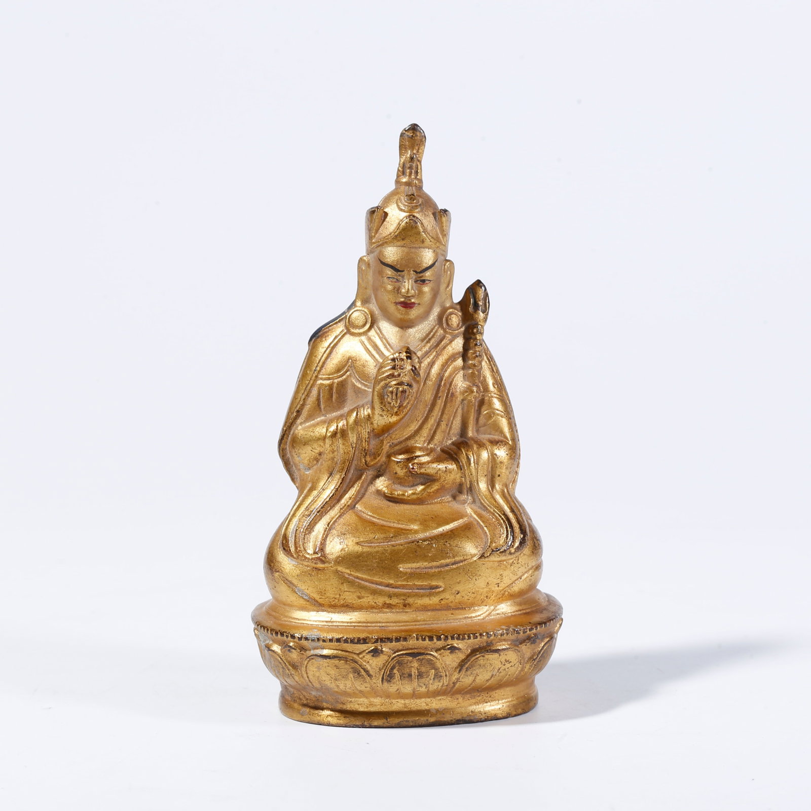 A GILT-BRONZE PADMASAMBHAVA FIGURE (1 of 9)
