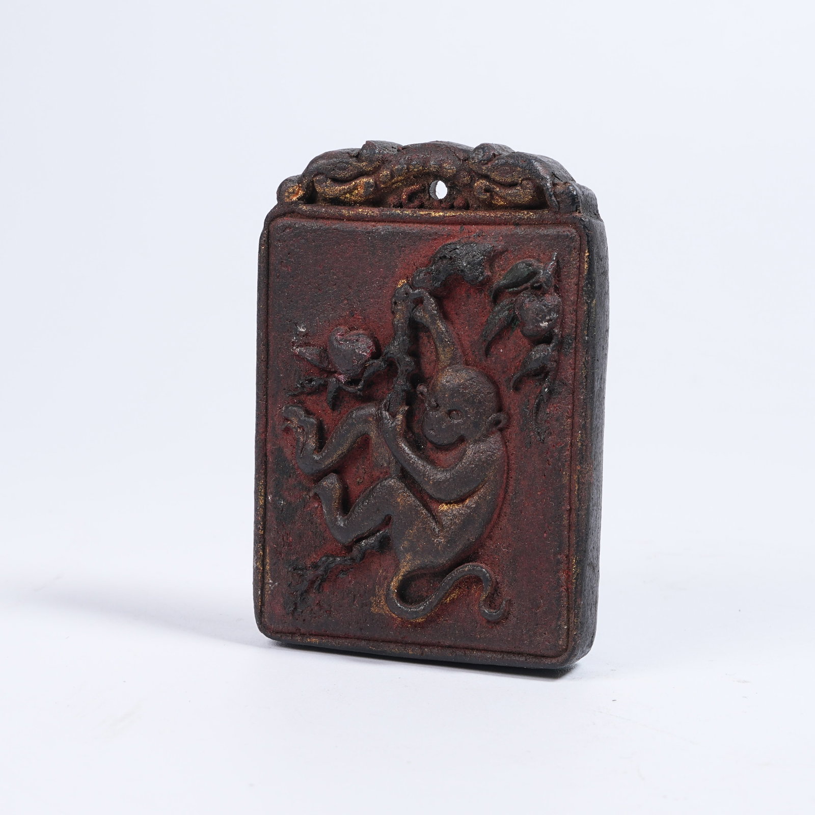 A INCENSE-CRAFTED MONKEY PRESENTING LONGEVITY PLAQUE: Incense-crafted Monkey Presenting Longevity Plaque