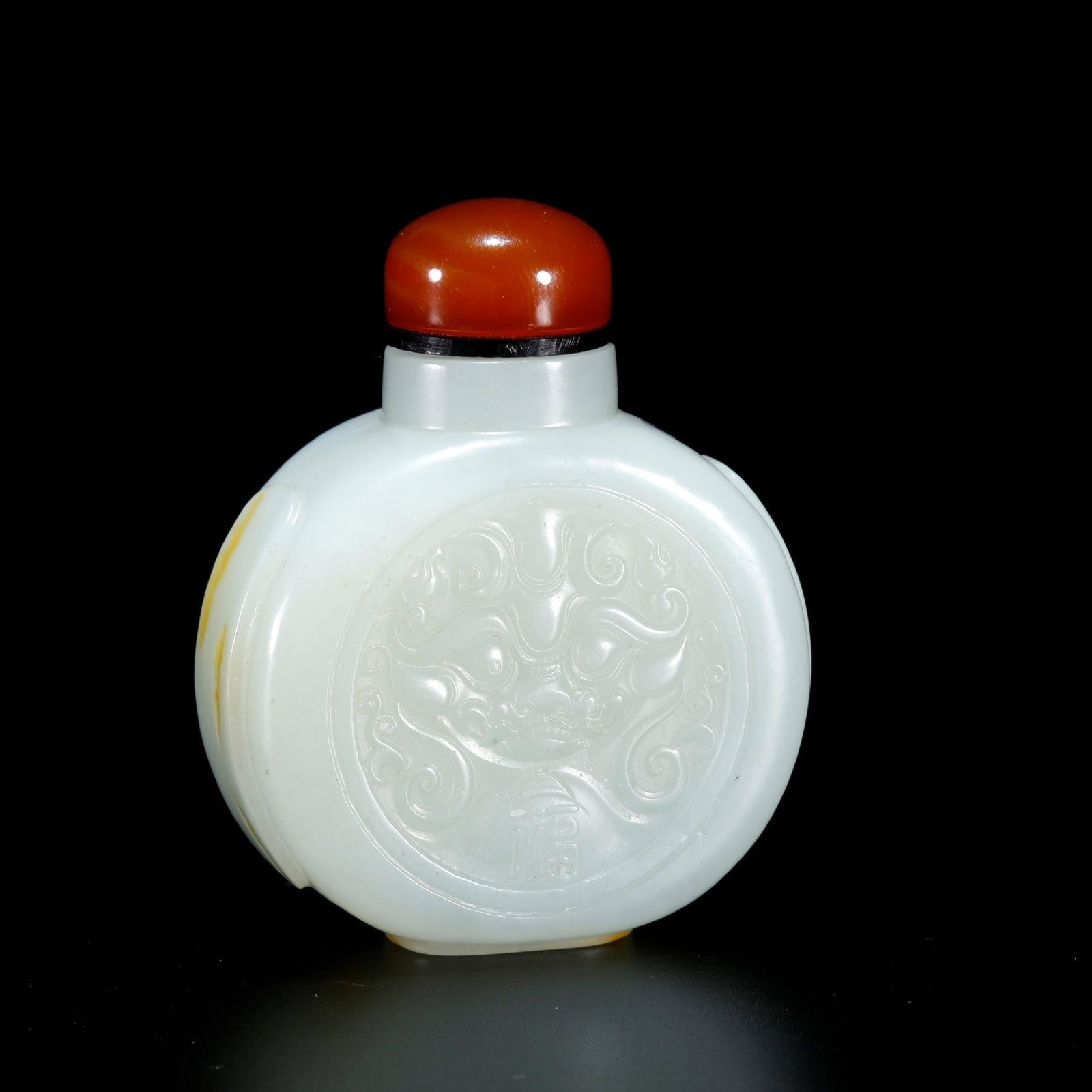 A HETIAN JADE SNUFF BOTTLE CARVED WITH BEAST MASK PATTERN (1 of 9)