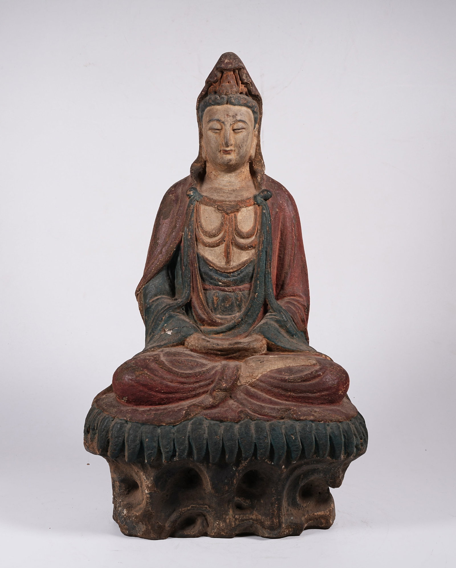 A PAINTED WOODEN SEATED GUANYIN (1 of 9)