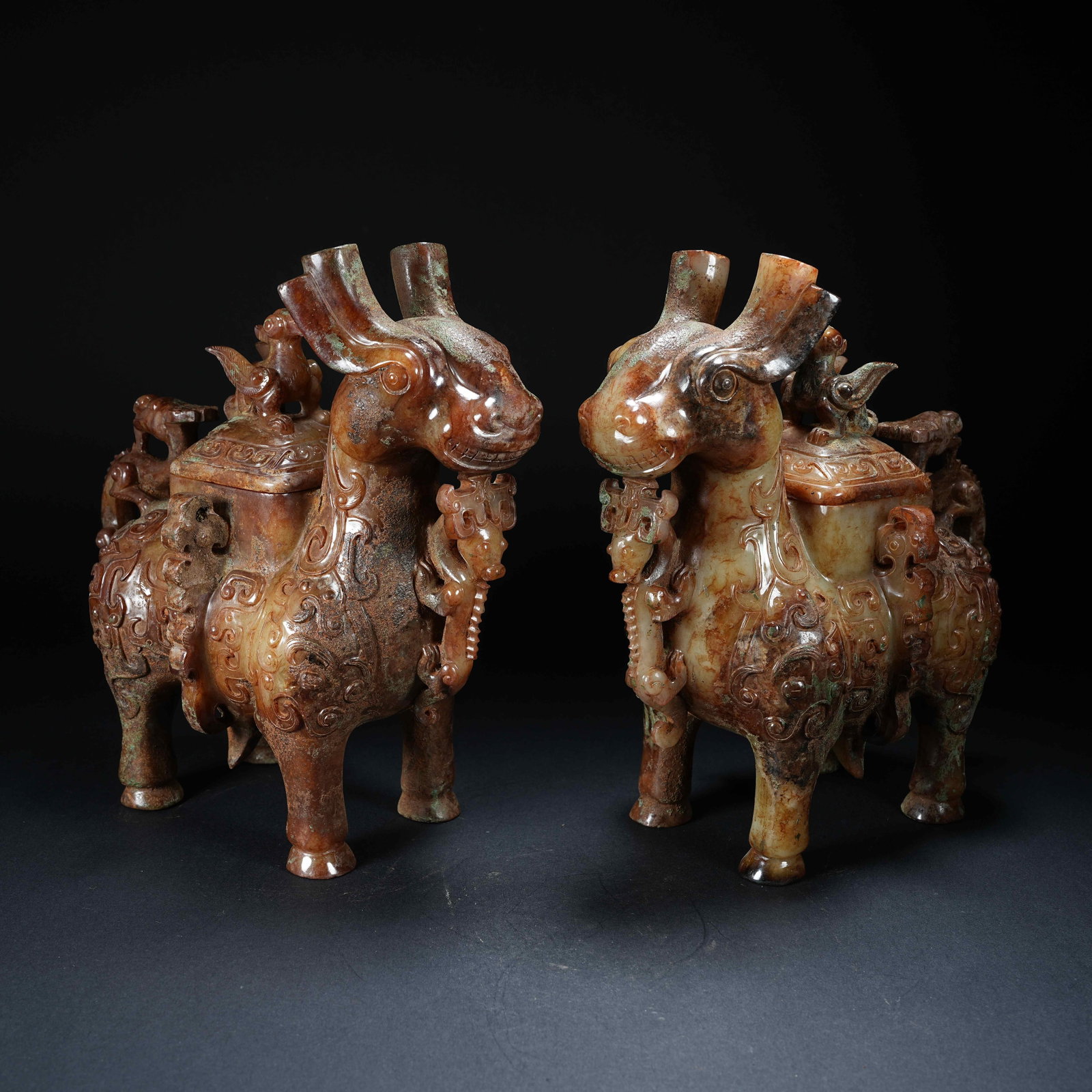 A SET OF ARCHAIC JADE ZOOMORPHIC ZUN VESSELS (1 of 10)