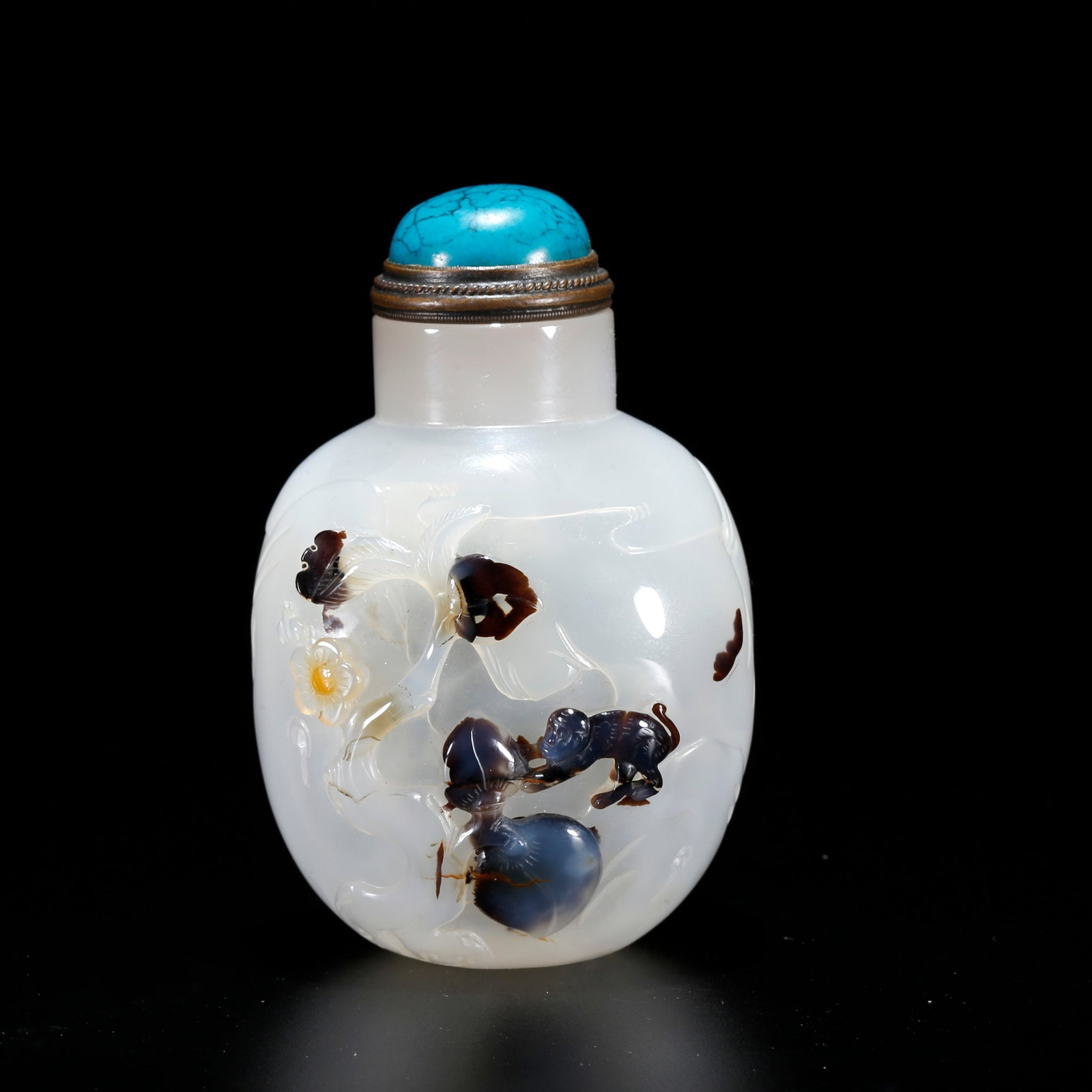 A AGATE SNUFF BOTTLE CARVED WITH MONKEY PATTERN: Agate Snuff Bottle Carved with Monkey Pattern