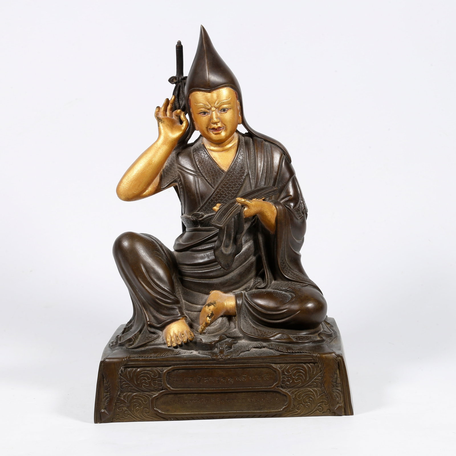 A GILT-BRONZE MASTER STATUE (PARTIALLY GILDED): Gilt-bronze master statue (partially gilded)