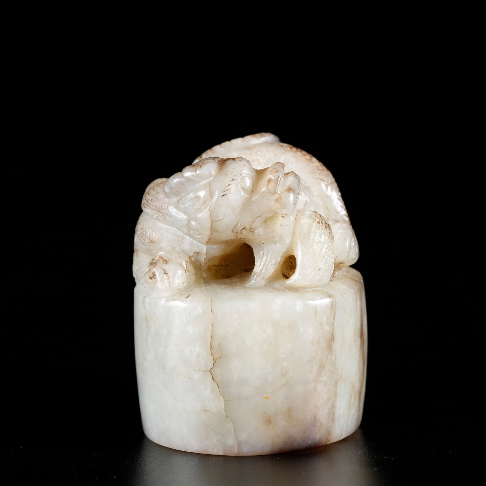 A HETIAN JADE CARVED BEAST-KNOB SEAL (1 of 9)