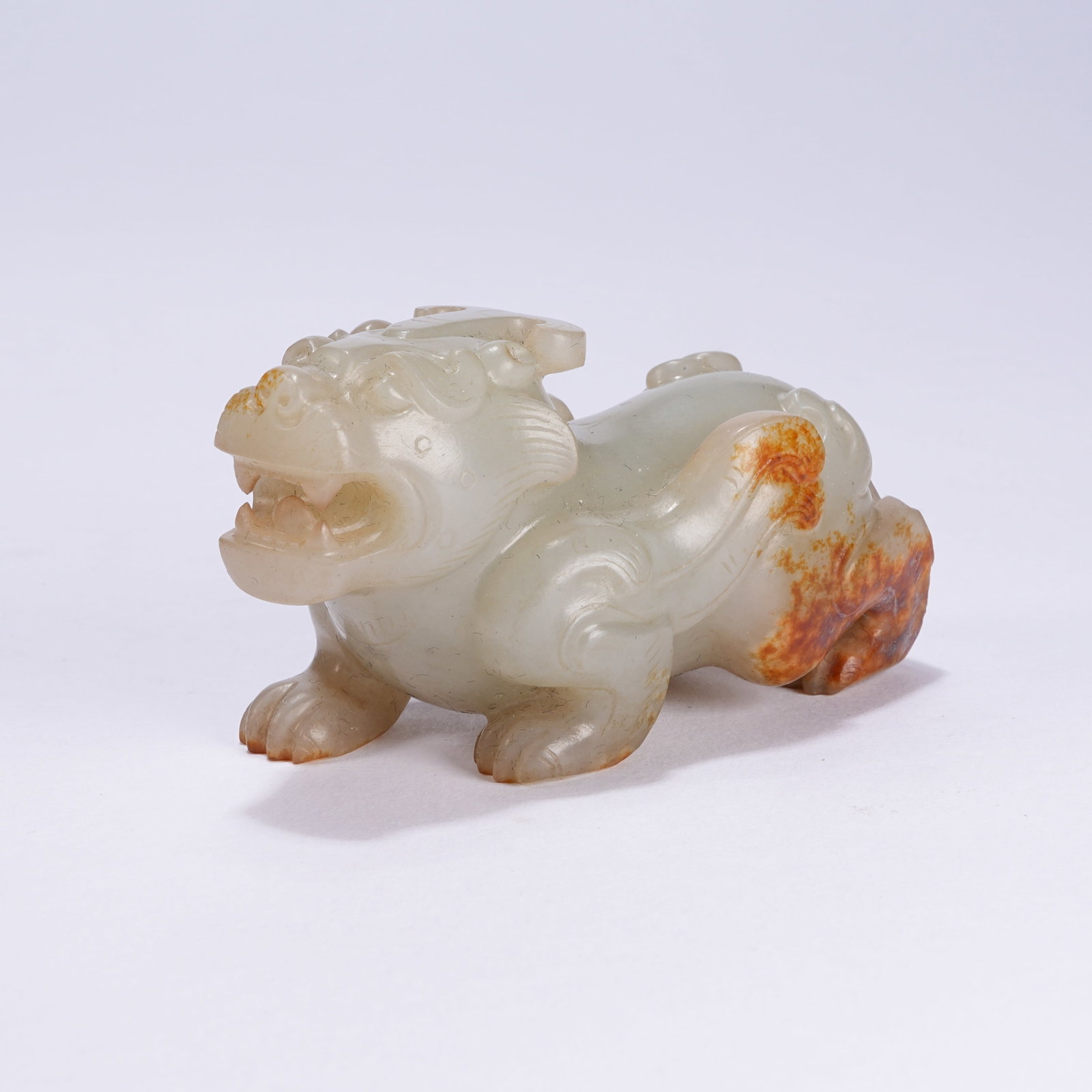 A ANCIENT JADE AUSPICIOUS BEAST ORNAMENT (1 of 8)