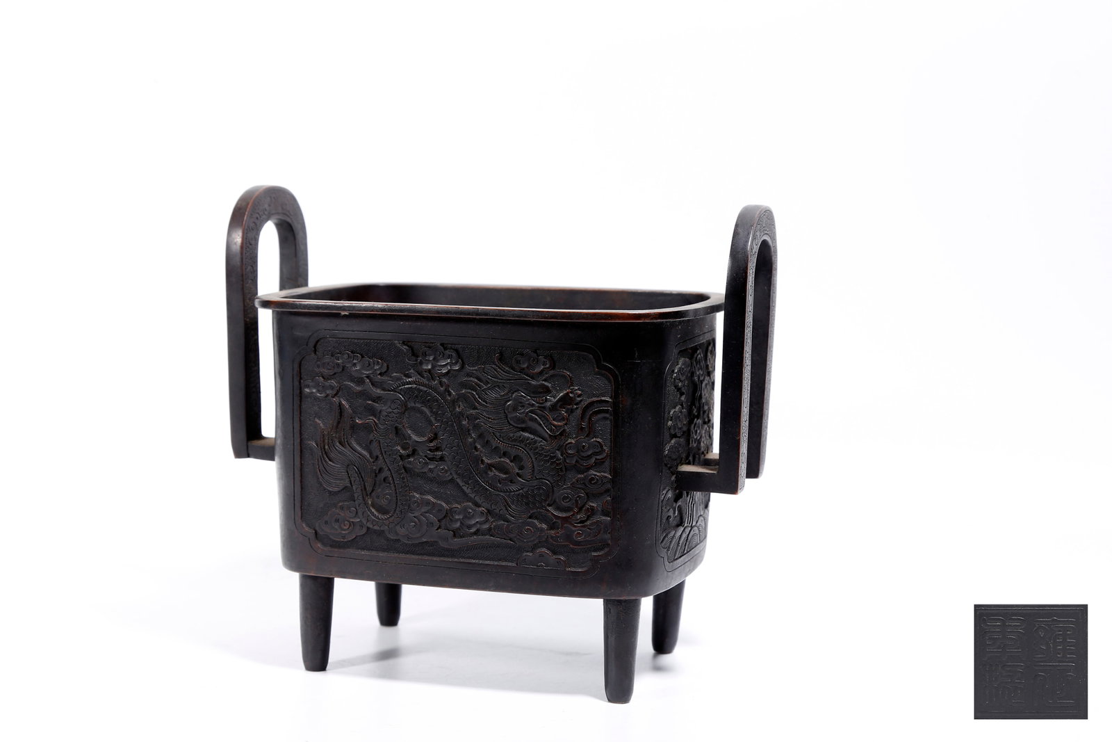 A BRONZE CENSER WITH CLOUD DRAGON PATTERNS AND UPRIGHT EARS: Bronze Censer with Cloud Dragon Patterns and Upright Ears