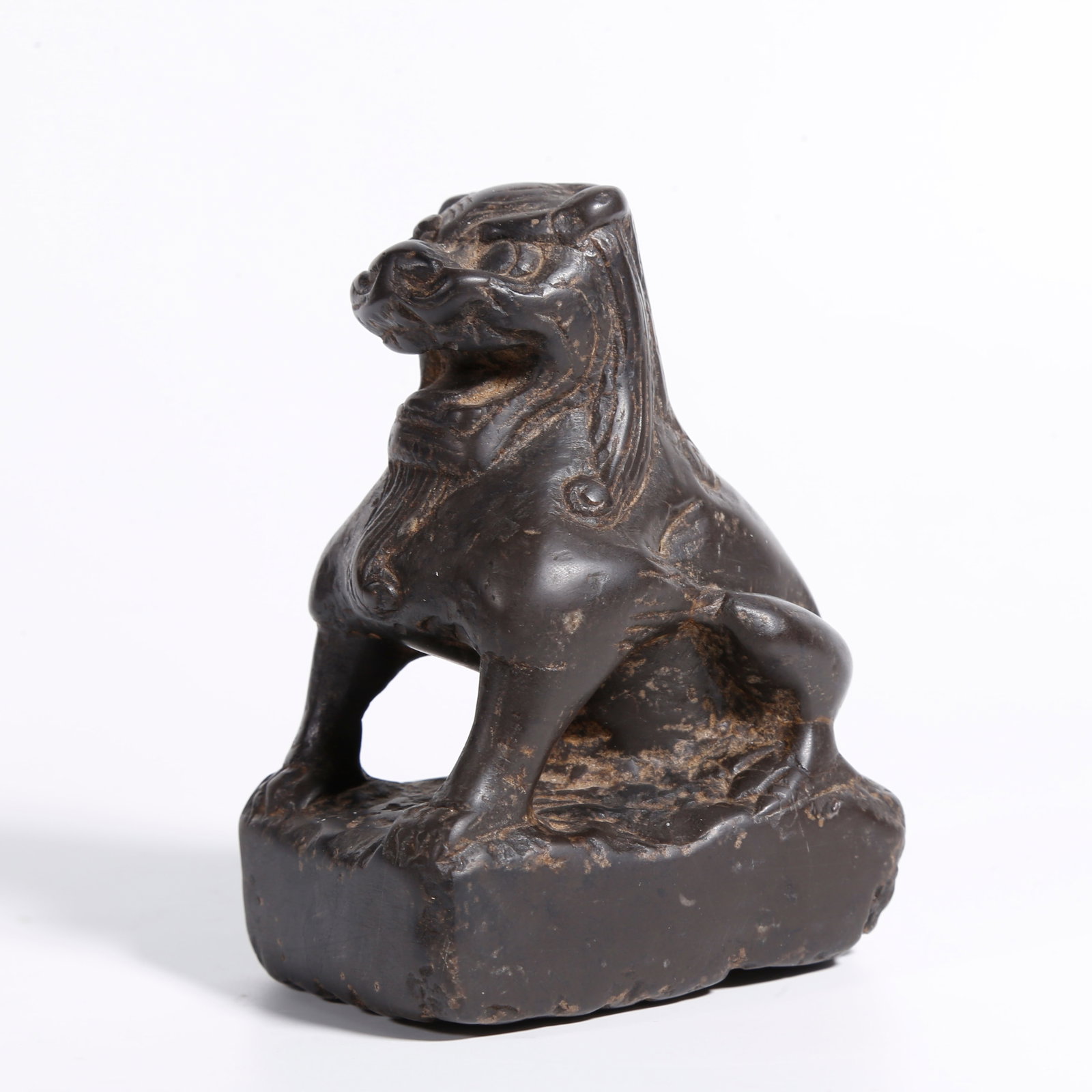 A STONE LION ORNAMENT: Stone Lion Ornament