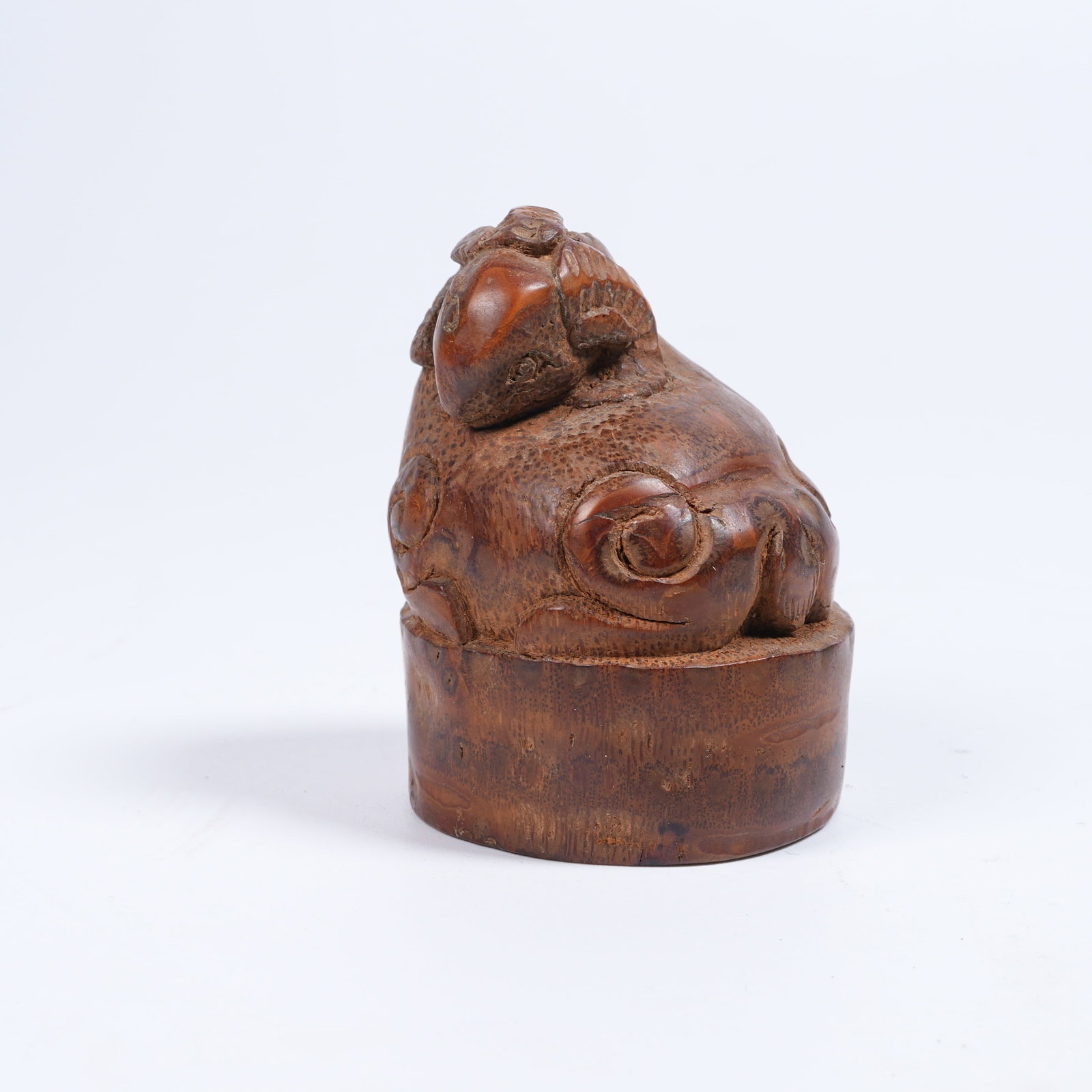 A BAMBOO ROOT CARVED SEAL MATERIAL WITH RECUMBENT SHEEP KNOB: Bamboo Root Carved Seal Material with Recumbent Sheep Knob