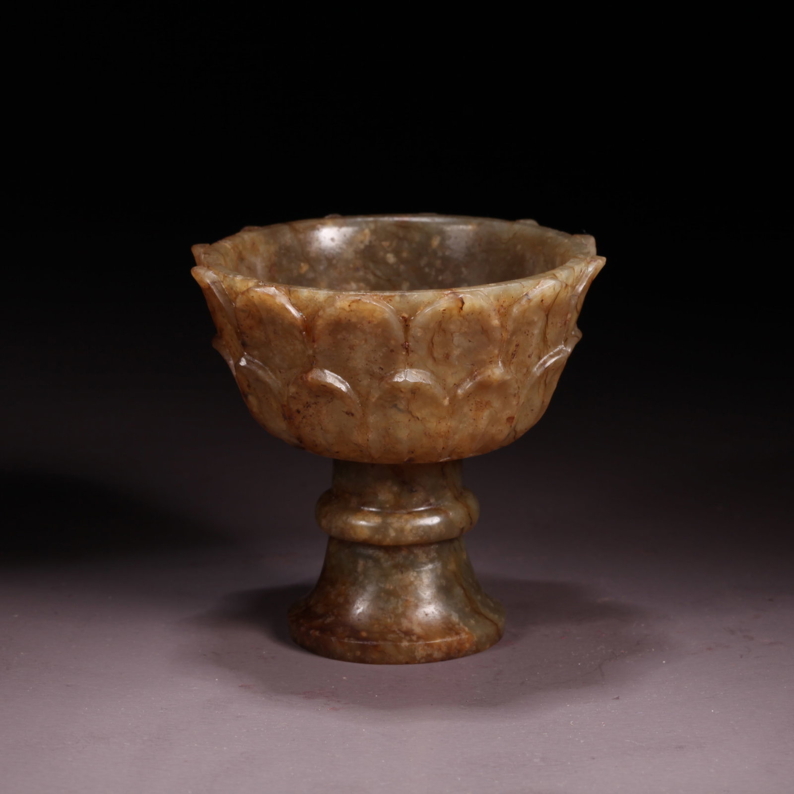 A HETIAN JADE LOTUS-FORMED STEM CUP: Hetian Jade Lotus-Formed Stem Cup