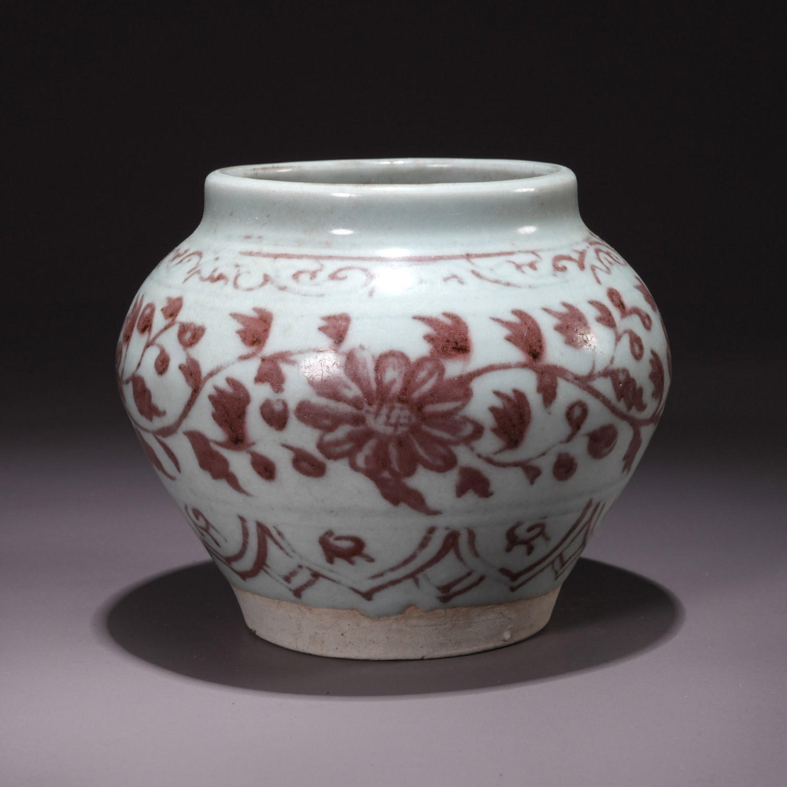 A ALUM-RED GLAZED JAR WITH LIANHUA FLOWER MOTIFS (1 of 9)