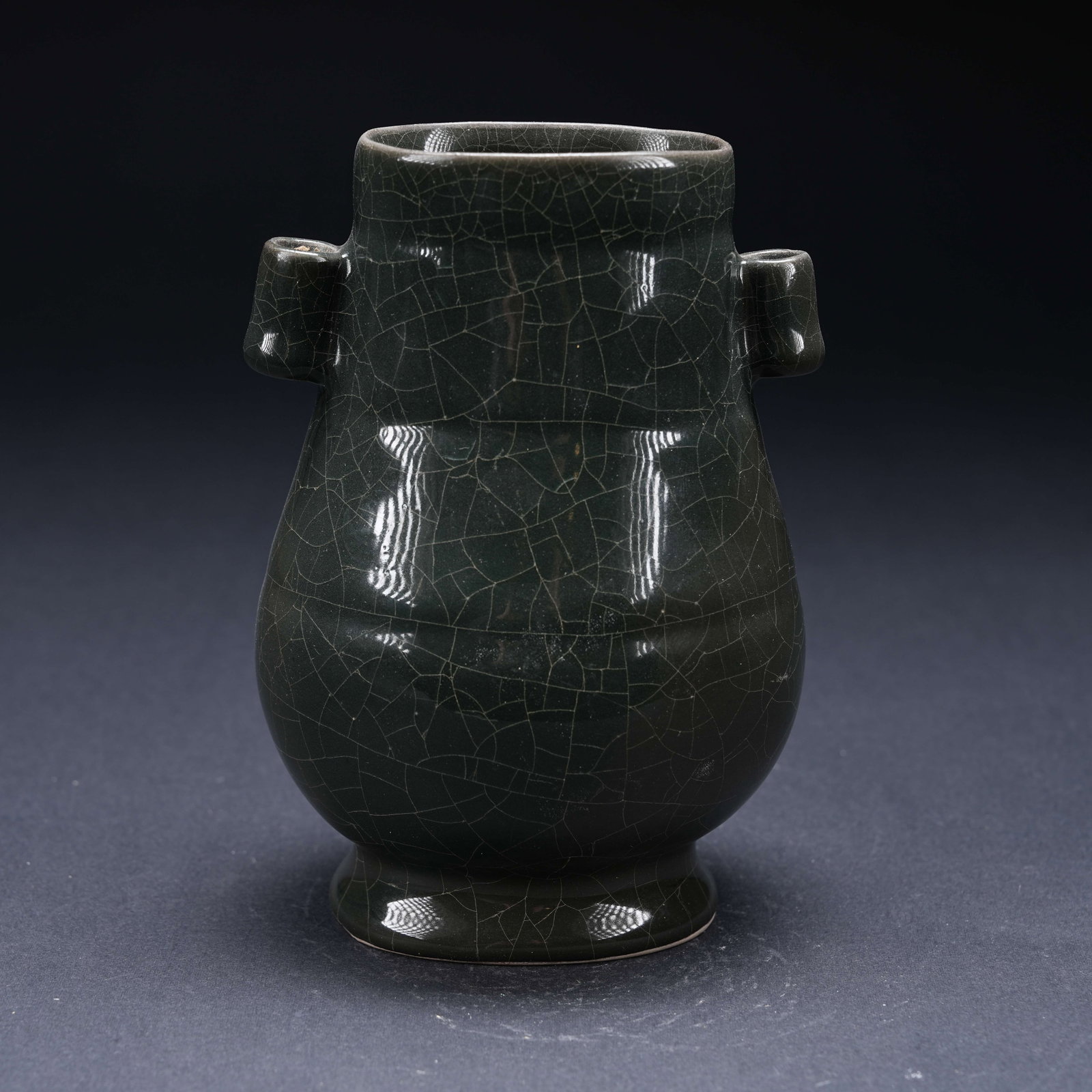 A GE KILN LOOP-HANDLED BOTTLE: Ge Kiln Loop-Handled Bottle