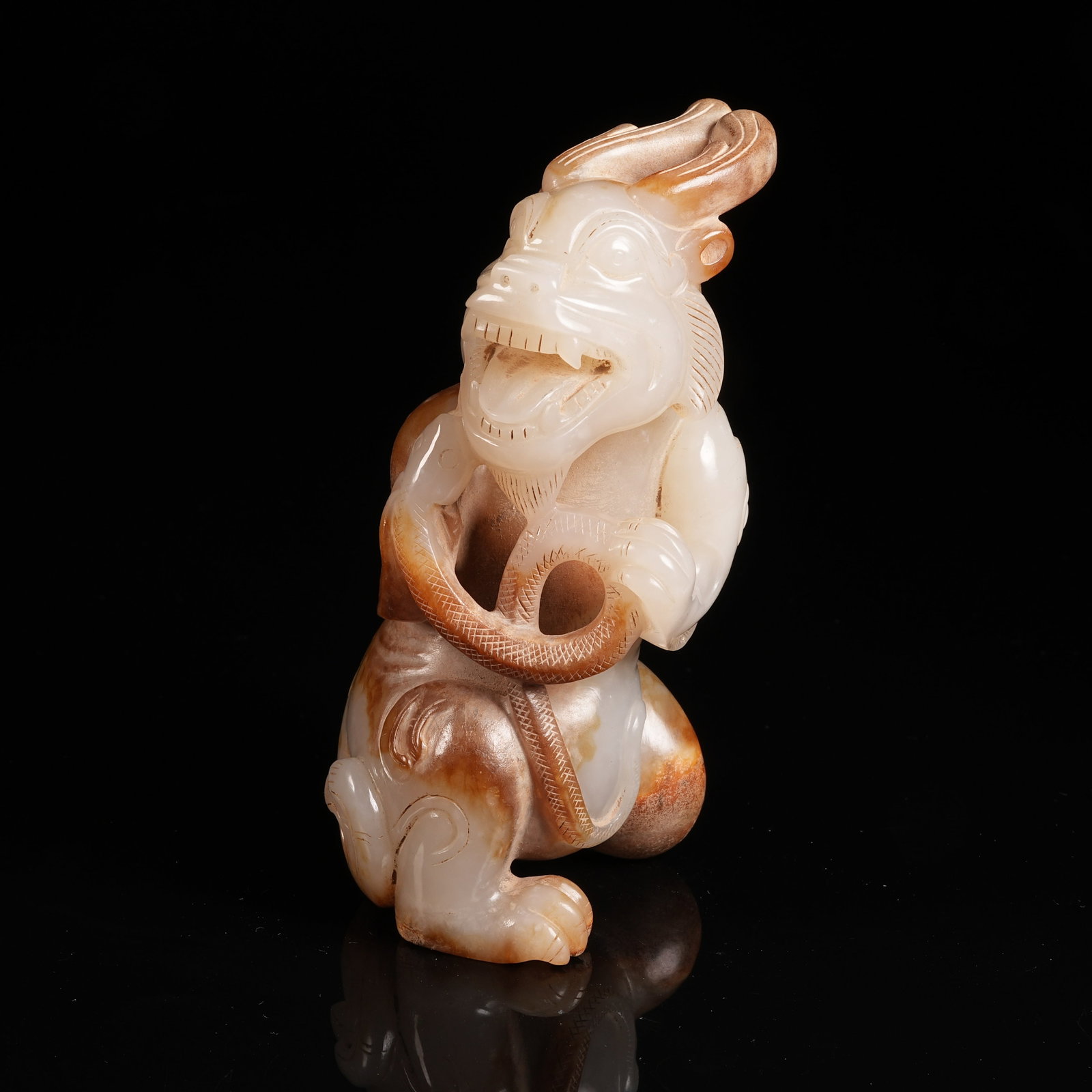 A ANCIENT JADE SEATED DRAGON ORNAMENT: Ancient Jade Seated Dragon Ornament