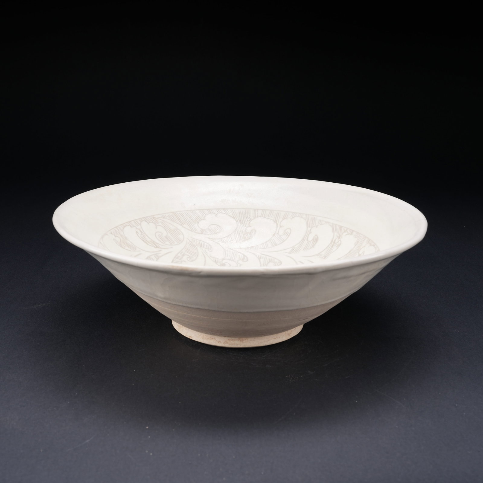 A DING KILN INCISED FLORAL PATTERN LARGE BOWL: Ding Kiln Incised Floral Pattern Large Bowl