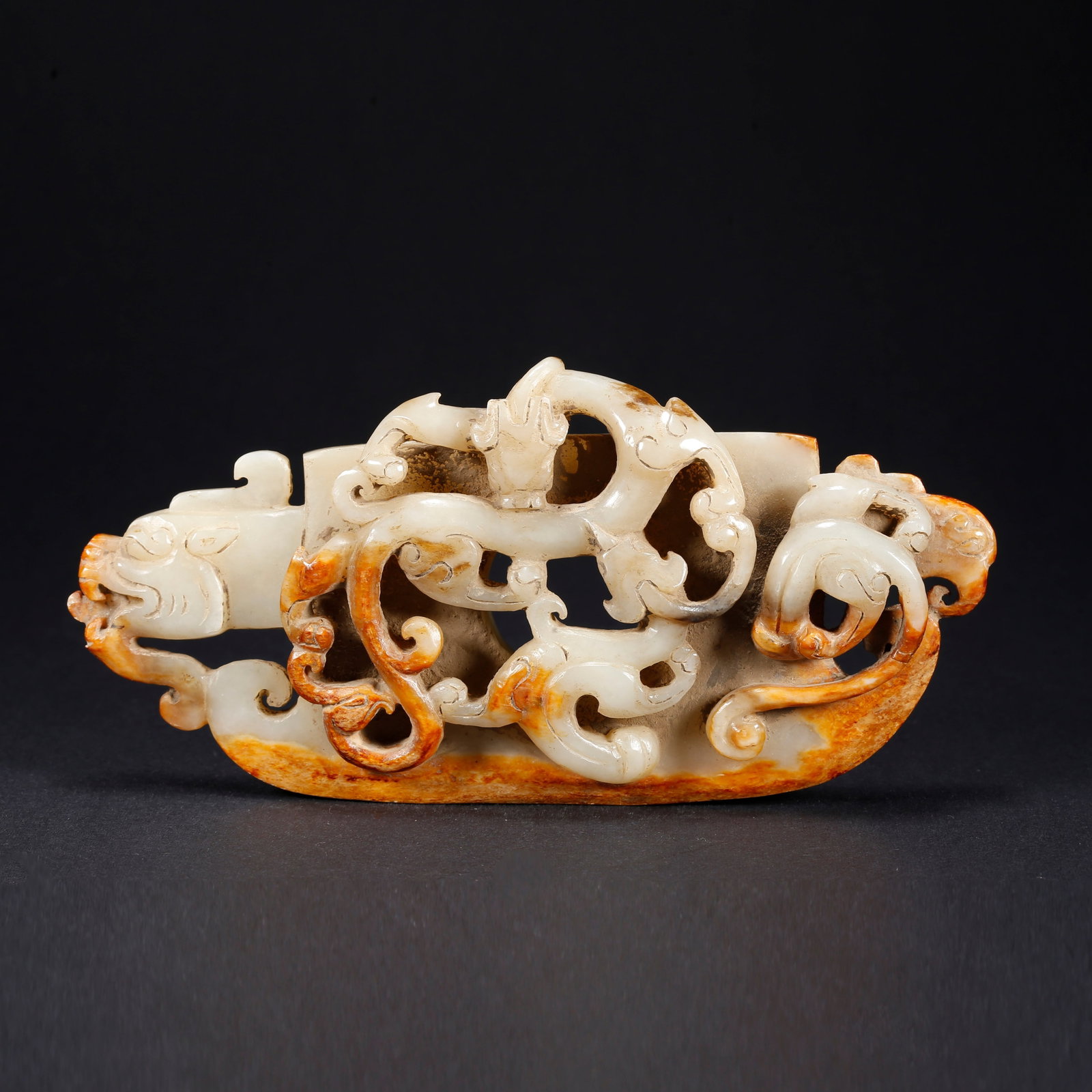 A HETIAN JADE DRAGON AND PHOENIX MOTIF AXE (1 of 10)
