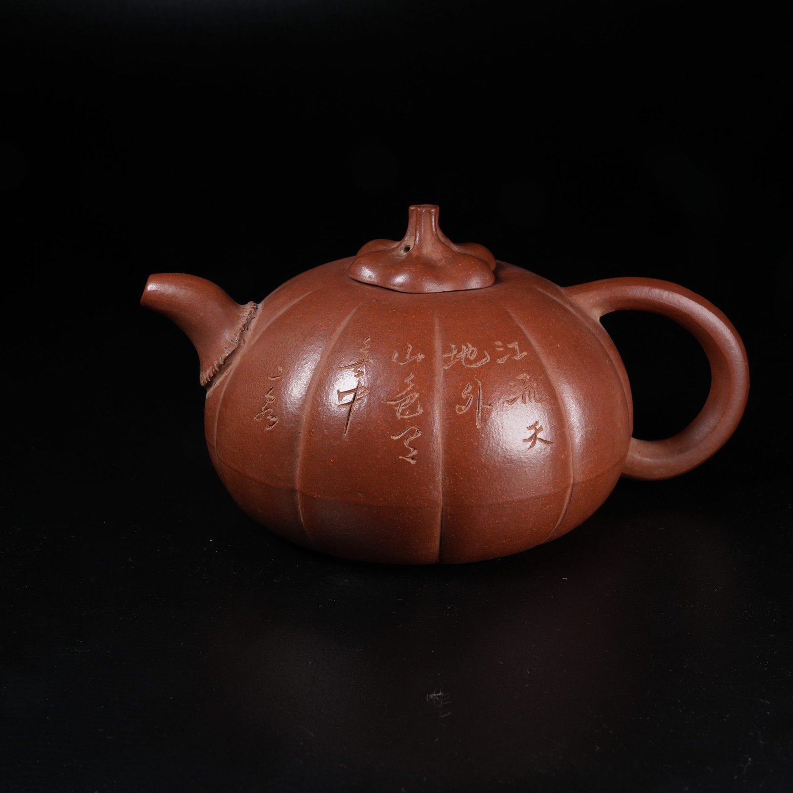 A YIXING ZISHA MELON-RIBBED EWER (1 of 9)