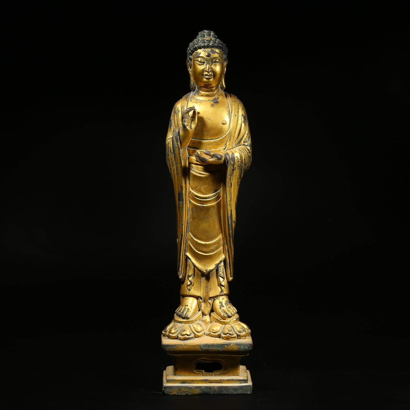 A GILDED BRONZE STANDING STATUE OF SHAKYAMUNI BUDDHA (1 of 8)