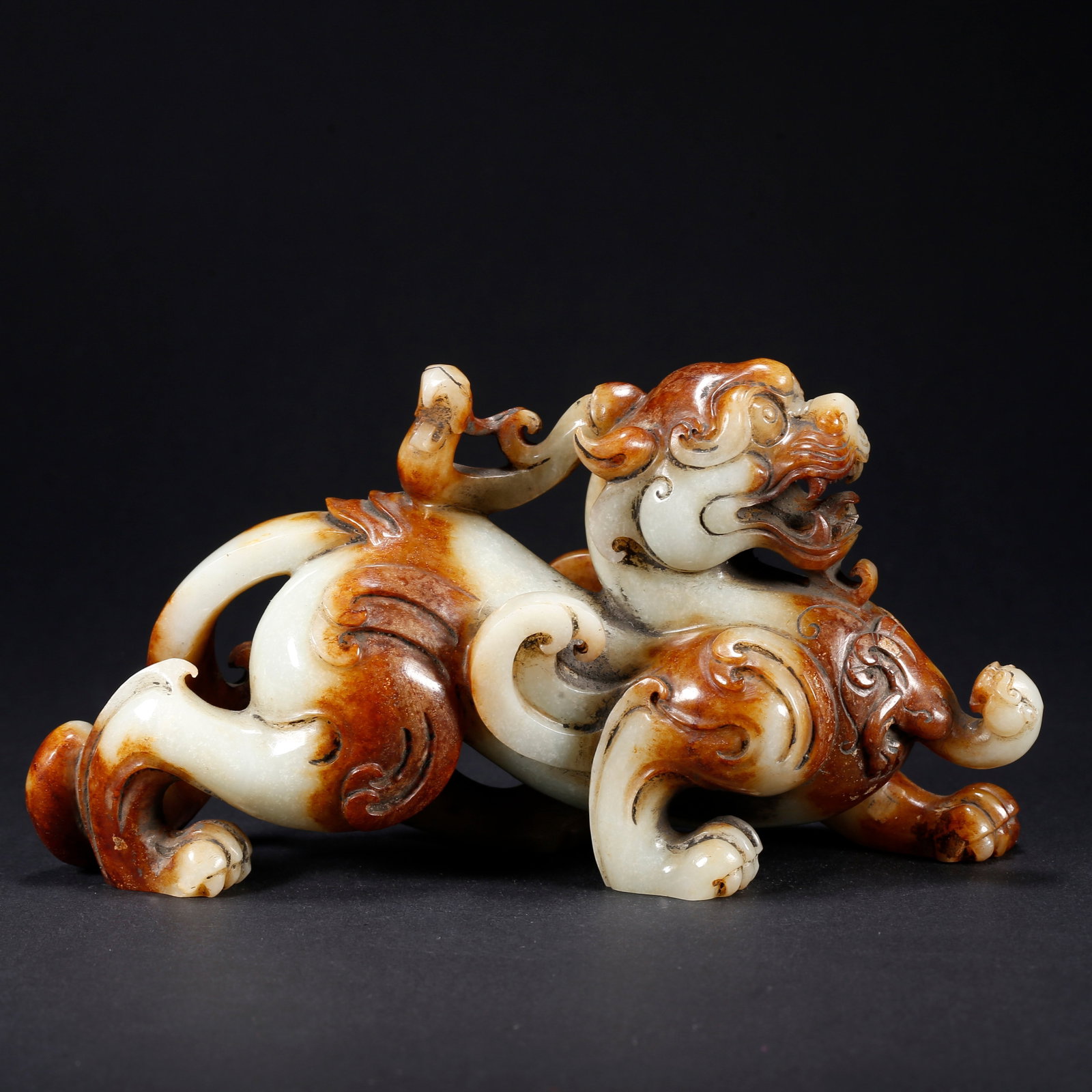 A HETIAN JADE CHI-TIGER FIGURINE: Hetian Jade Chi-Tiger Figurine