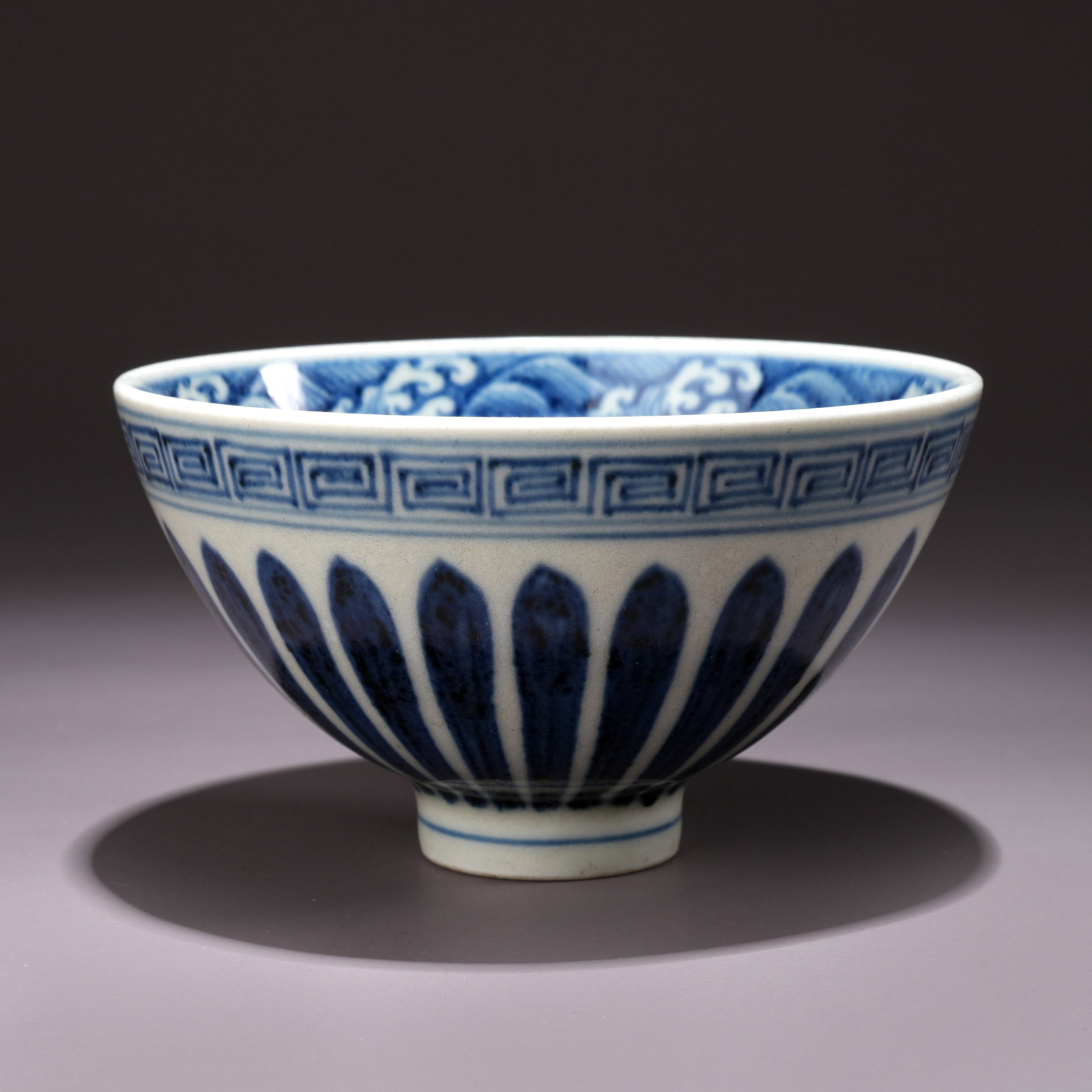 A BLUE-AND-WHITE BOWL WITH LIANHUA FLOWER MOTIFS: Blue-and-White Bowl with Lianhua Flower Motifs