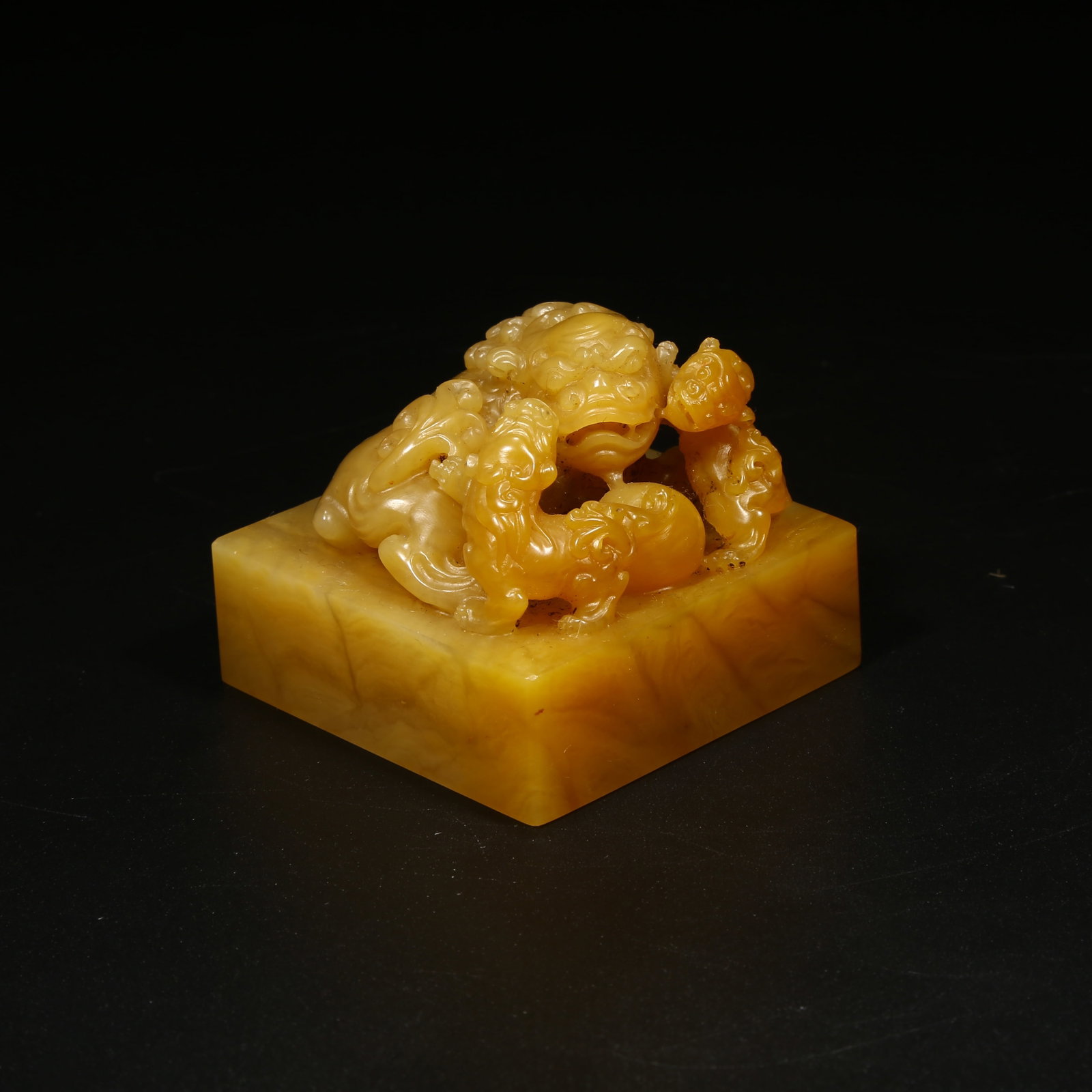 A SHOUSHAN TIANHUANG STONE SEAL WITH LARGE AND SMALL LION KNOB: Shoushan Tianhuang Stone Seal with Large and Small Lion Knob