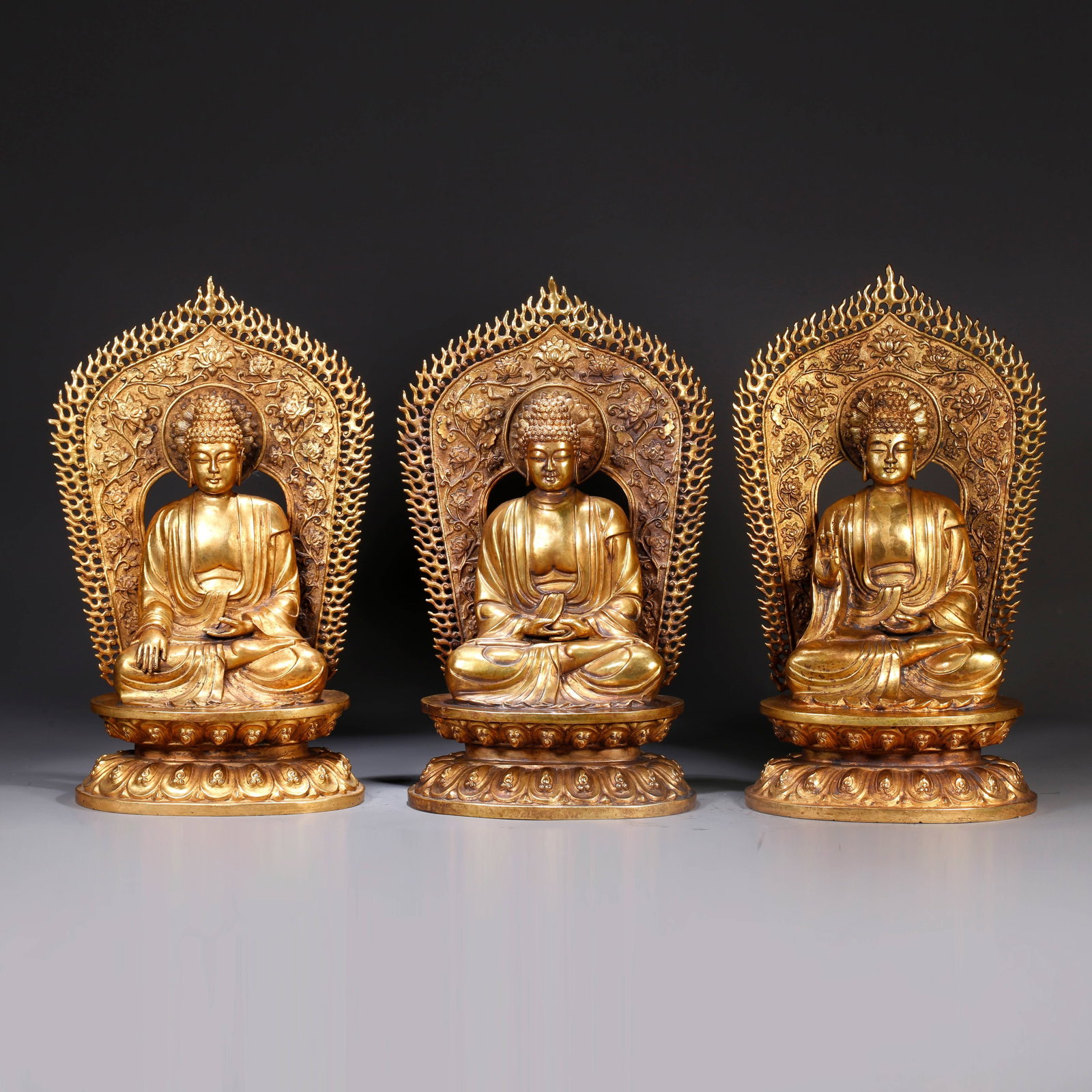 A SET OF GILT BRONZE BUDDHA STATUES (1 of 11)