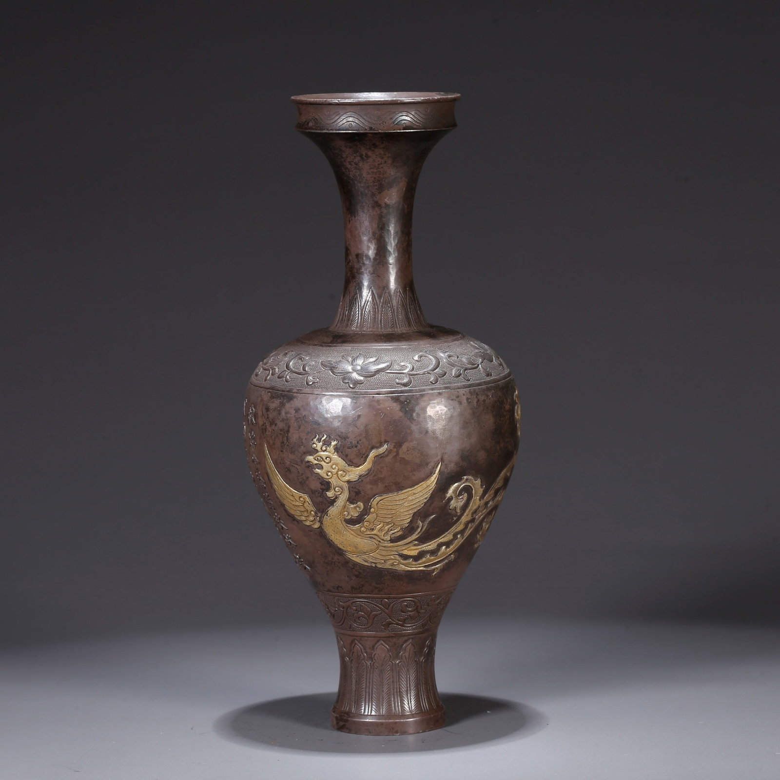 A SILVER APPRECIATION VASE WITH PARTIAL GILT AND PHOENIX MOTIF: Silver appreciation vase with partial gilt and phoenix motif