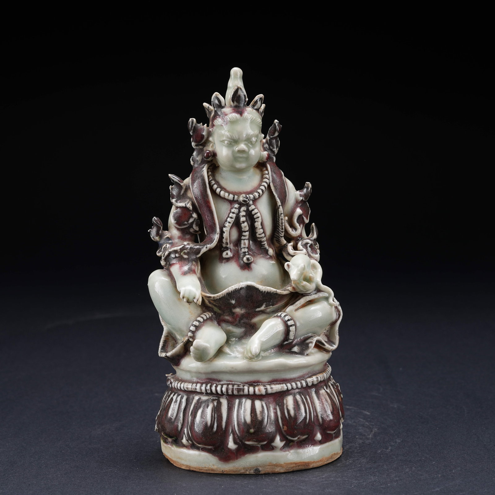 A UNDERGLAZE RED AND YELLOW GOD OF WEALTH FIGURE: Underglaze Red and Yellow God of Wealth Figure