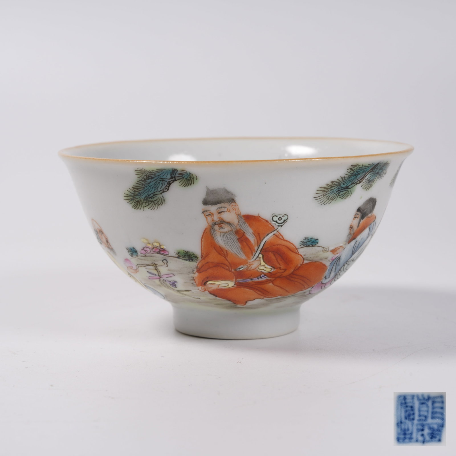 A FAMILLE ROSE CUP WITH SCHOLAR UNDER PINE SCENE: Famille Rose Cup with Scholar Under Pine Scene