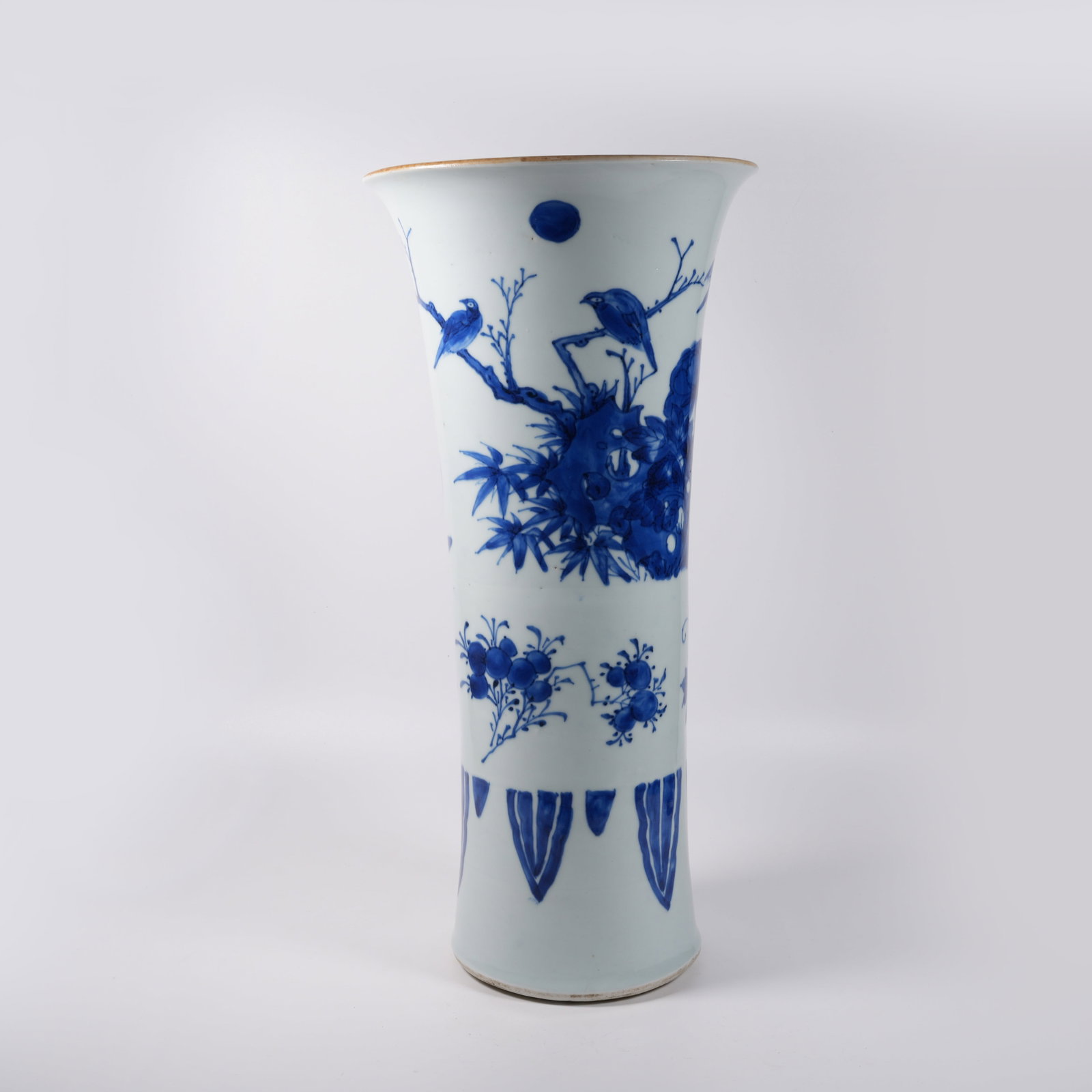 A BLUE AND WHITE GU VASE WITH ROCK, FLOWER AND BIRD PATTERN (1 of 10)