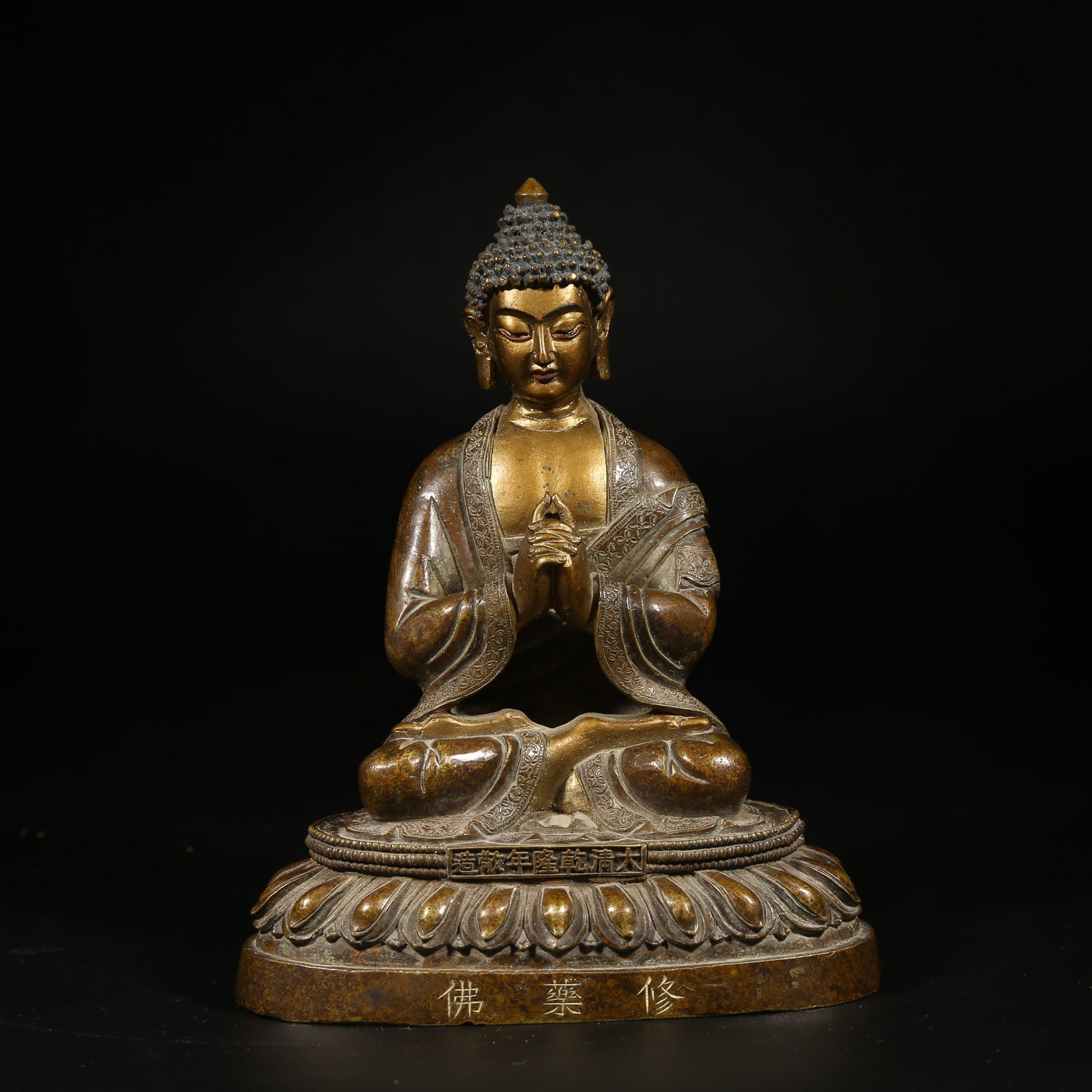 A BRONZE MUD-GILDED STATUE OF VAIROCANA (1 of 8)