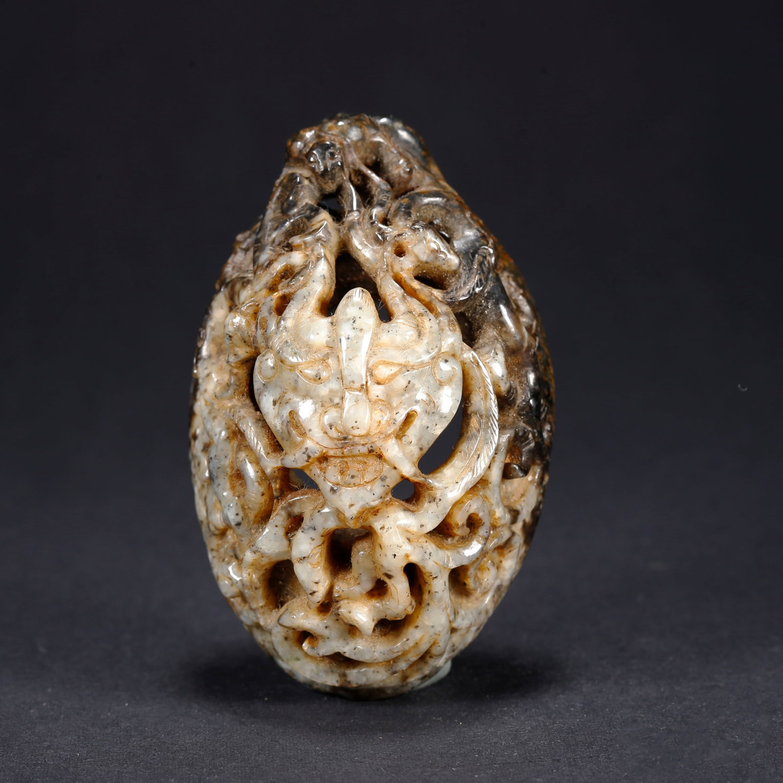 A HETIAN JADE CHICKEN-HEART PENDANT: Hetian Jade Chicken-Heart Pendant