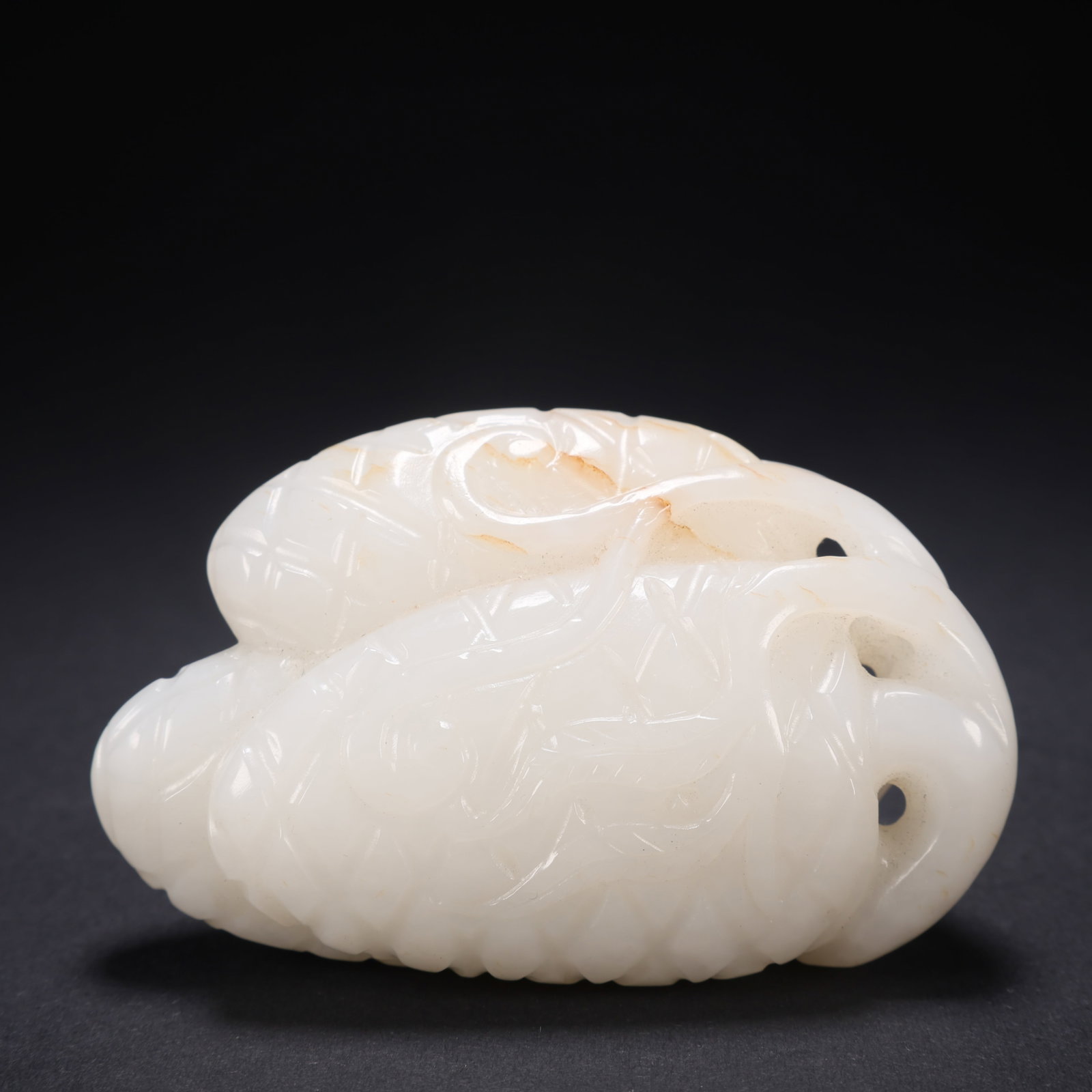A HETIAN JADE TWIN-LOTUS LYCHEE: Hetian Jade Twin-Lotus Lychee